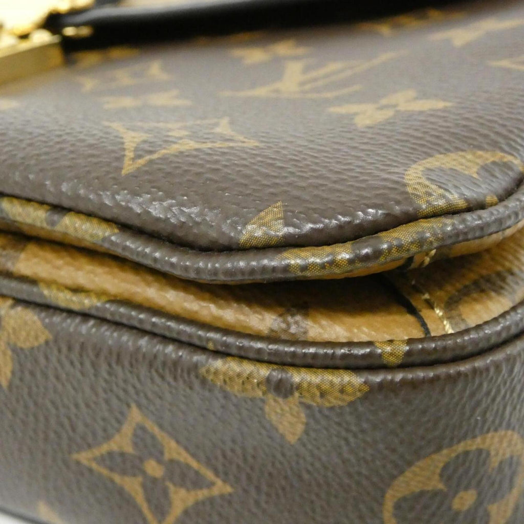 Pochette Metis Reverse Monogram Canvas