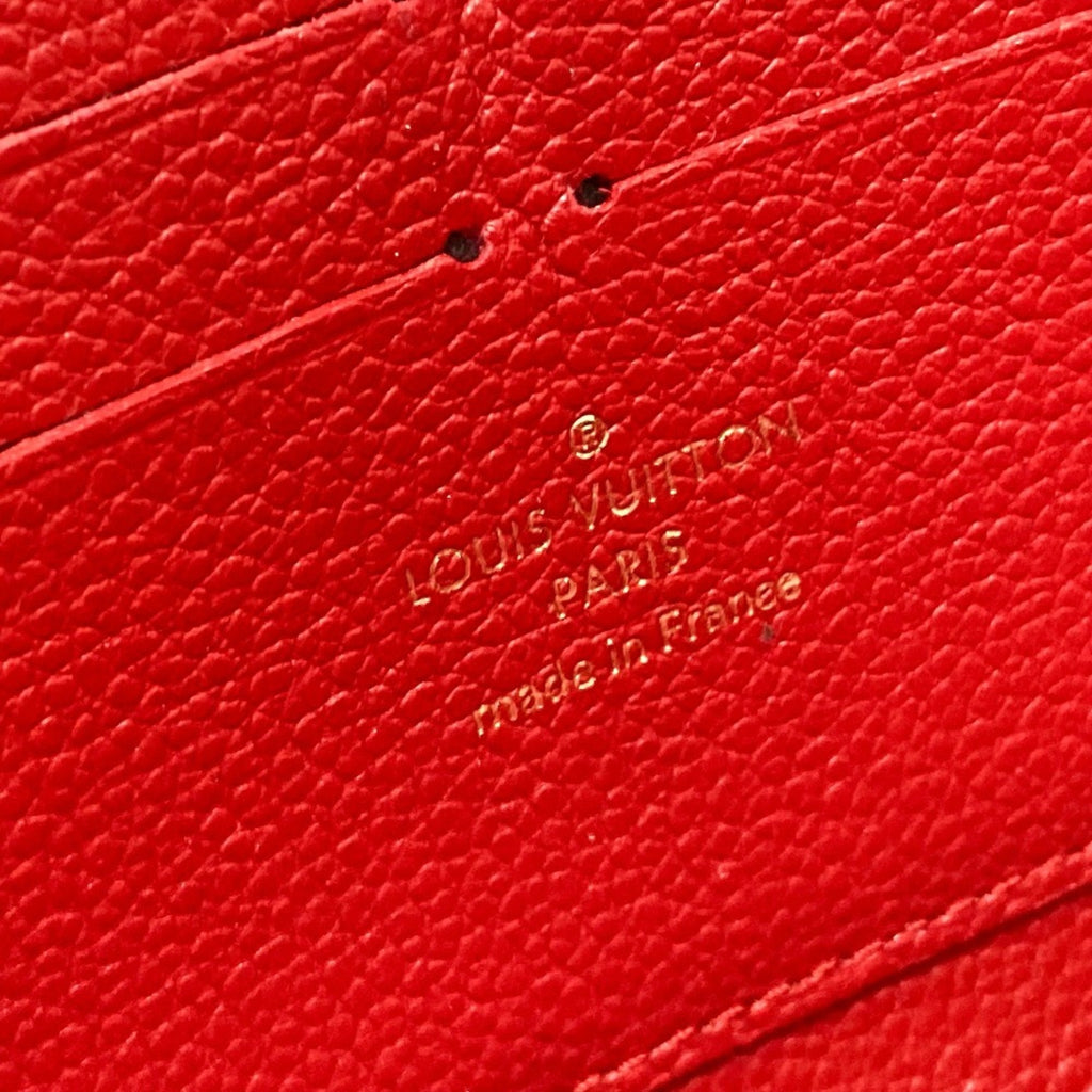 Louis Vuitton Monogram Empreinte Cerise Red Color Monogram Empreinte Long Wallet (Bi-Fold) (Pre-Owned)
