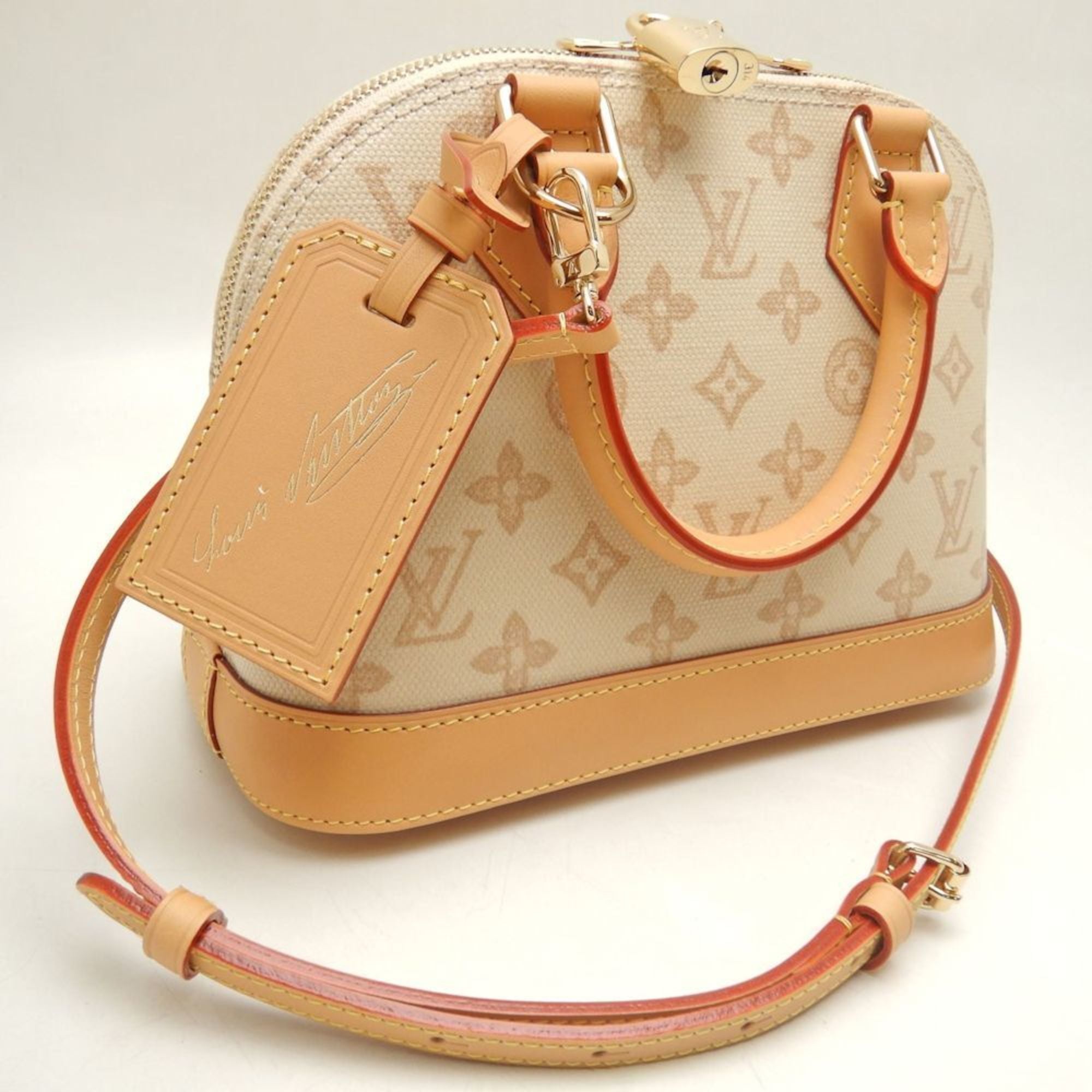 Louis Vuitton Gold Canvas Leather Handbag (Pre-Owned)