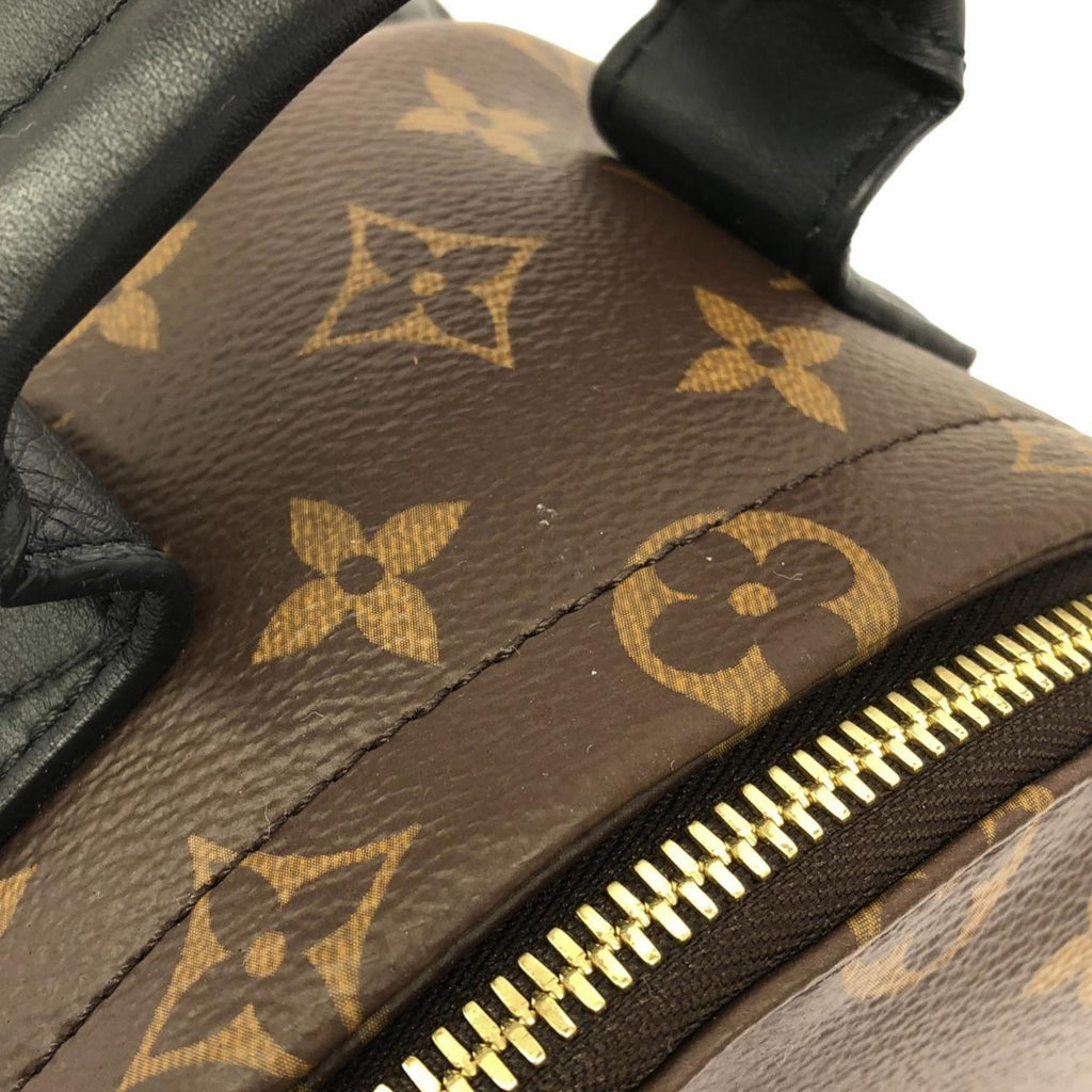 Louis Vuitton Brown Coated Canvas Backpack (Pre-Owned)