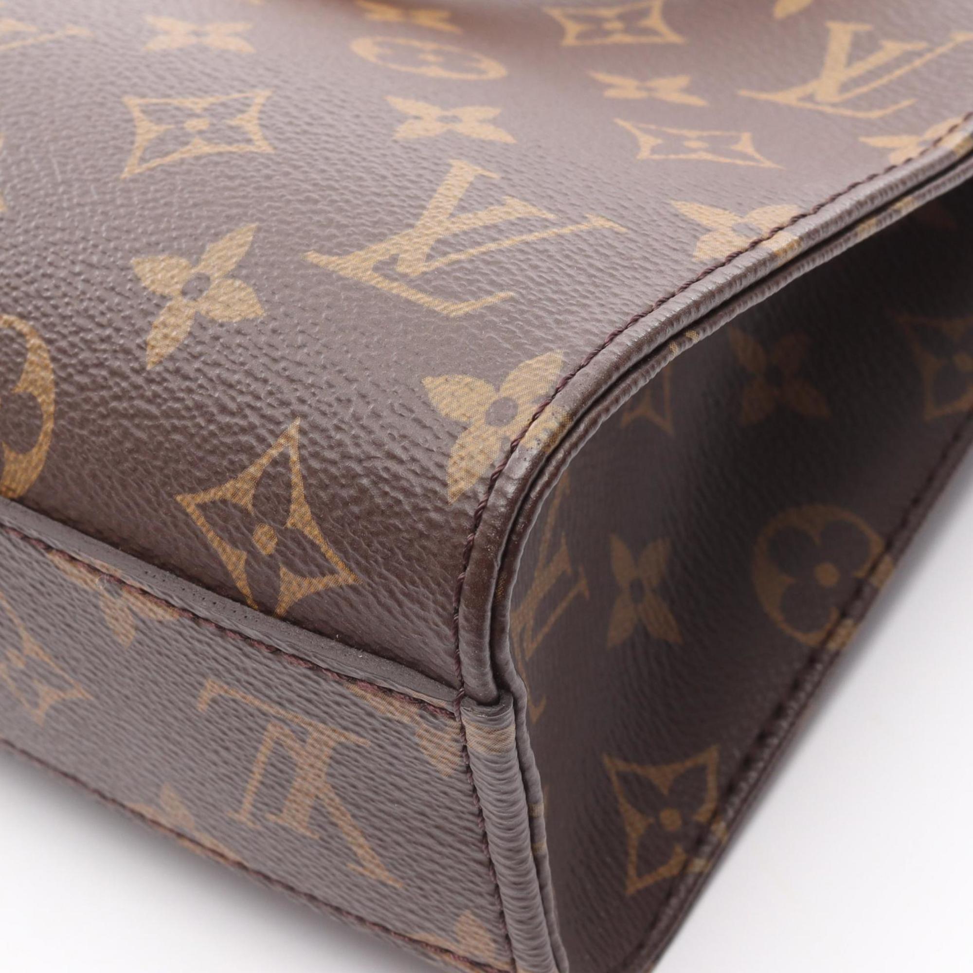 Louis Vuitton Brown Coated Canvas Leather Handbag (Pre-Owned)