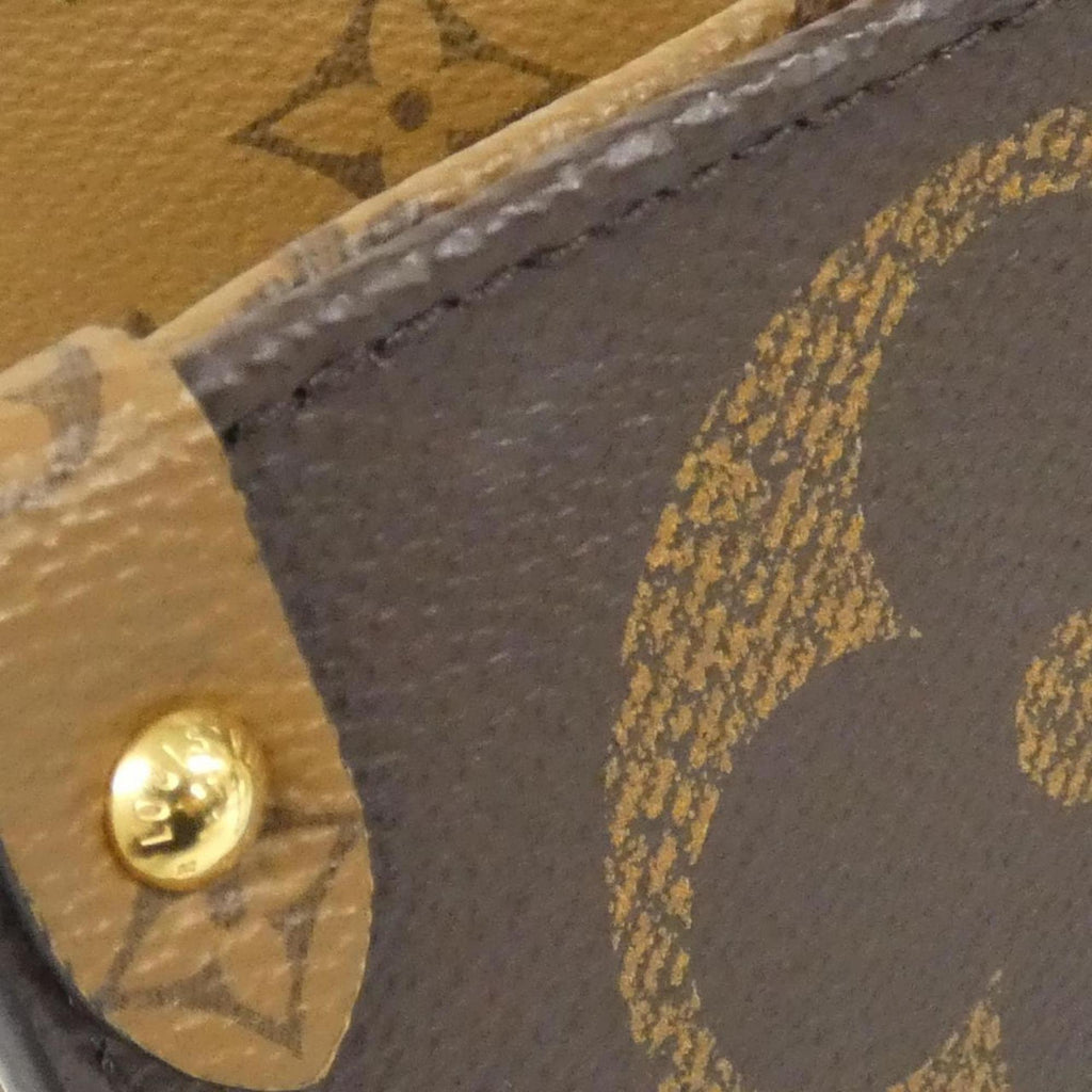 Louis Vuitton Brown Coated Canvas Handbag (Pre-Owned)