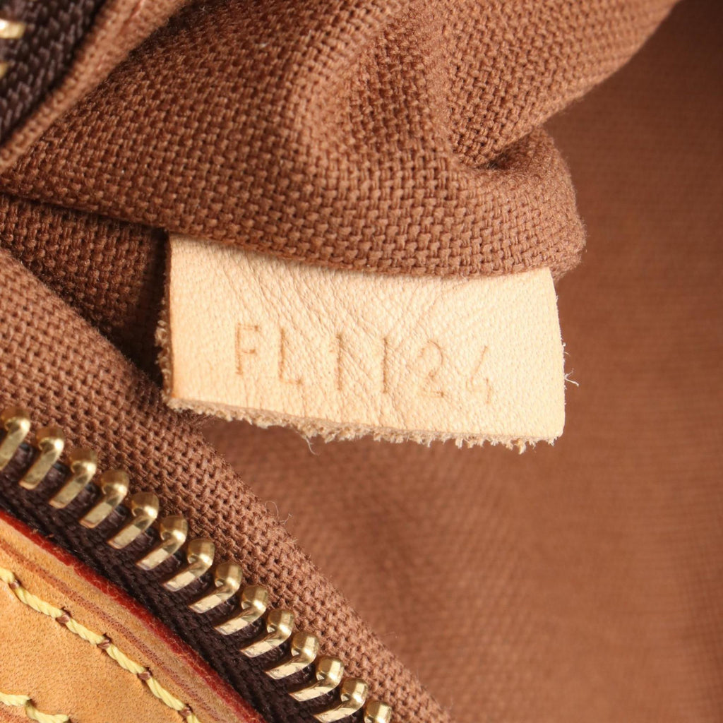 Louis Vuitton Brown Coated Canvas Leather Backpack (Pre-Owned)