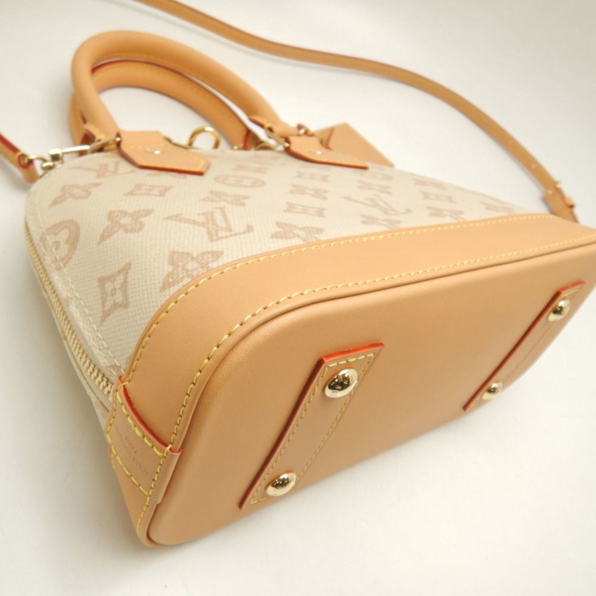 Louis Vuitton Gold Canvas Leather Handbag (Pre-Owned)