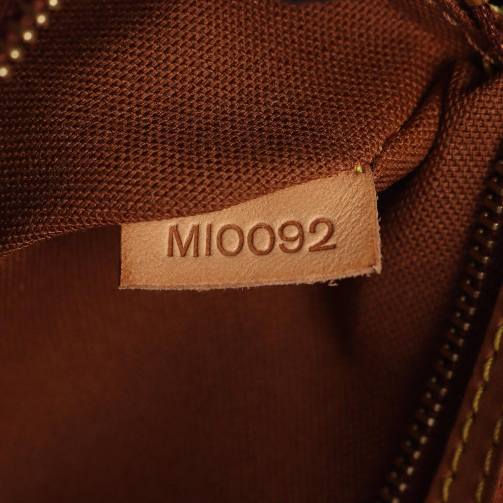 Louis Vuitton Brown Coated Canvas Pvc Monogram Leather Handbag (Pre-Owned)