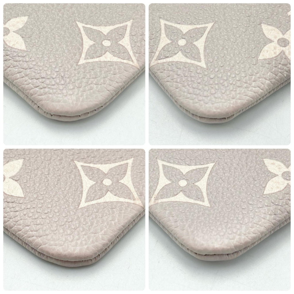 Louis Vuitton Grayish Monogram Empreinte Pochette (Pre-Owned)
