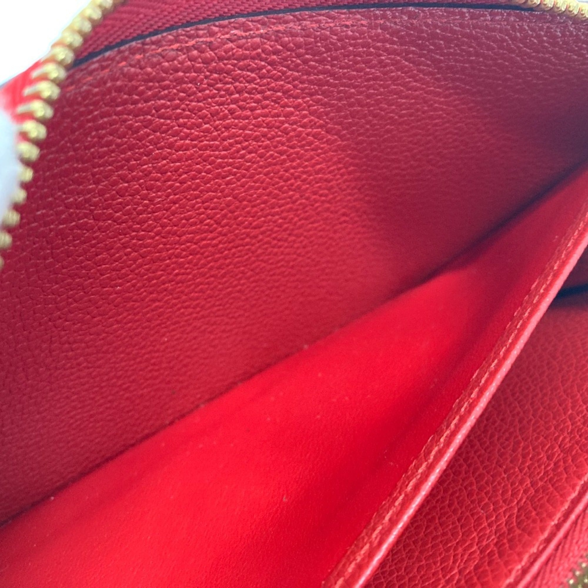 Louis Vuitton Monogram Empreinte Cerise Red Color Monogram Empreinte Long Wallet (Bi-Fold) (Pre-Owned)