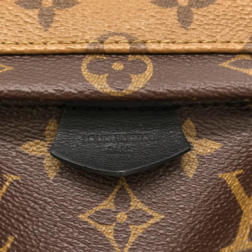Louis Vuitton Brown Coated Canvas Backpack (Pre-Owned)