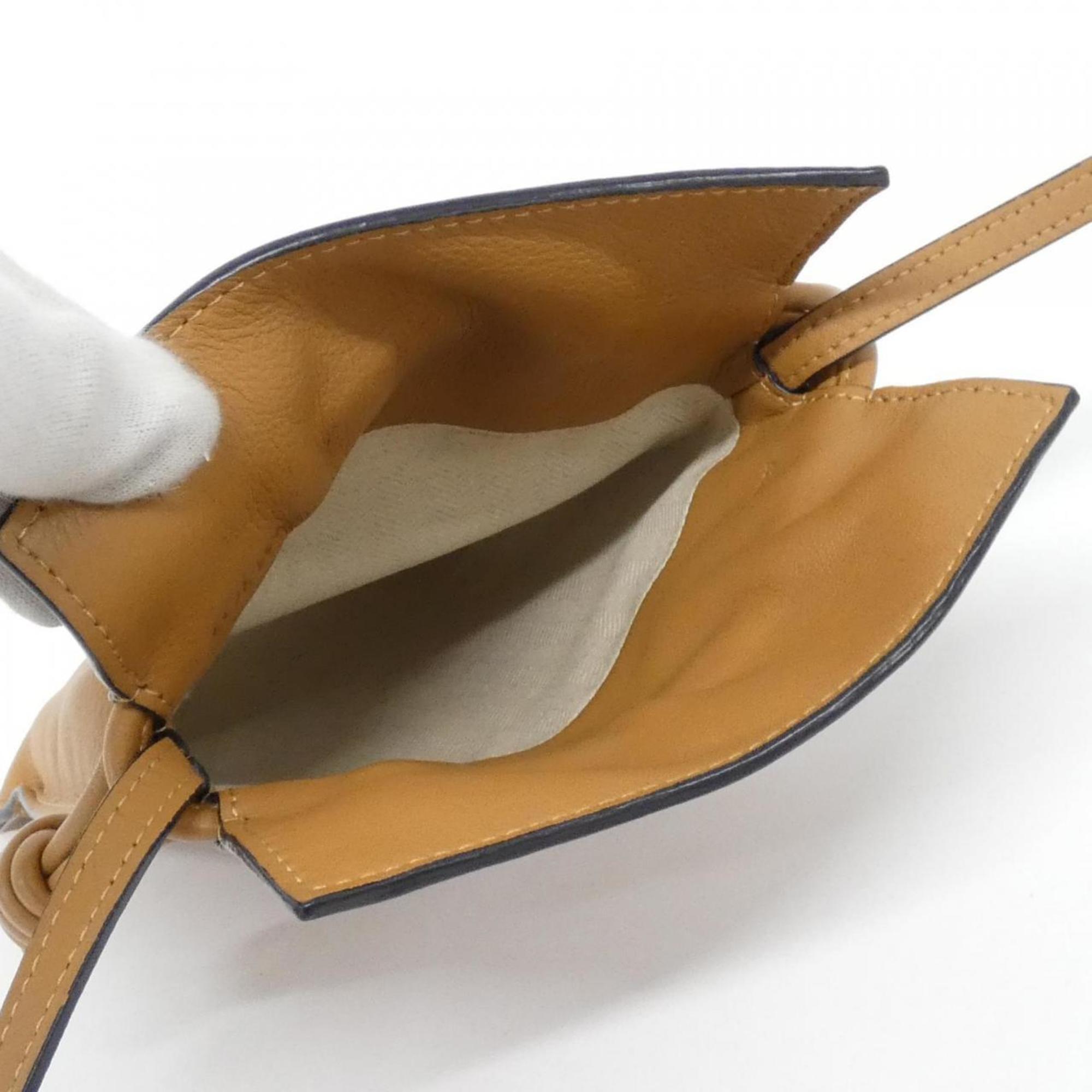Flamenco Knot Clutch Leather Mini