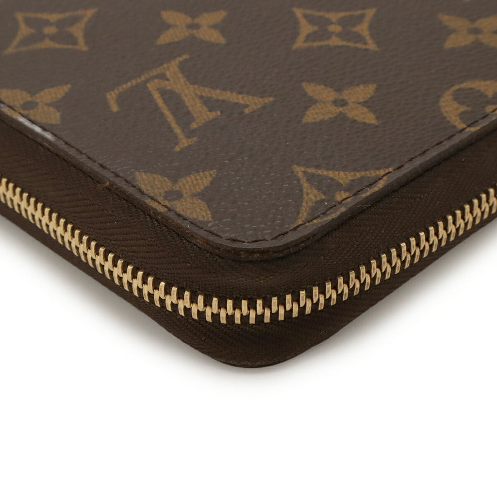 Louis Vuitton Brown Monogram Pvc Long Wallet (Bi-Fold) (Pre-Owned)
