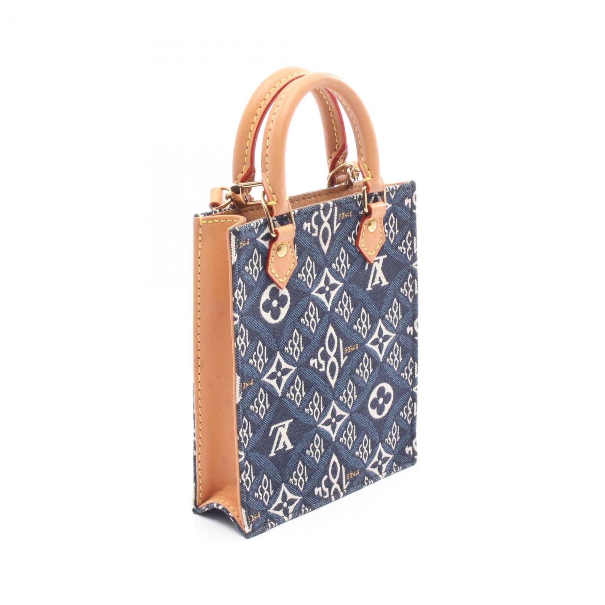 Louis Vuitton Brown Navy White Canvas Leather Monogram Jacquard Handbag (Pre-Owned)