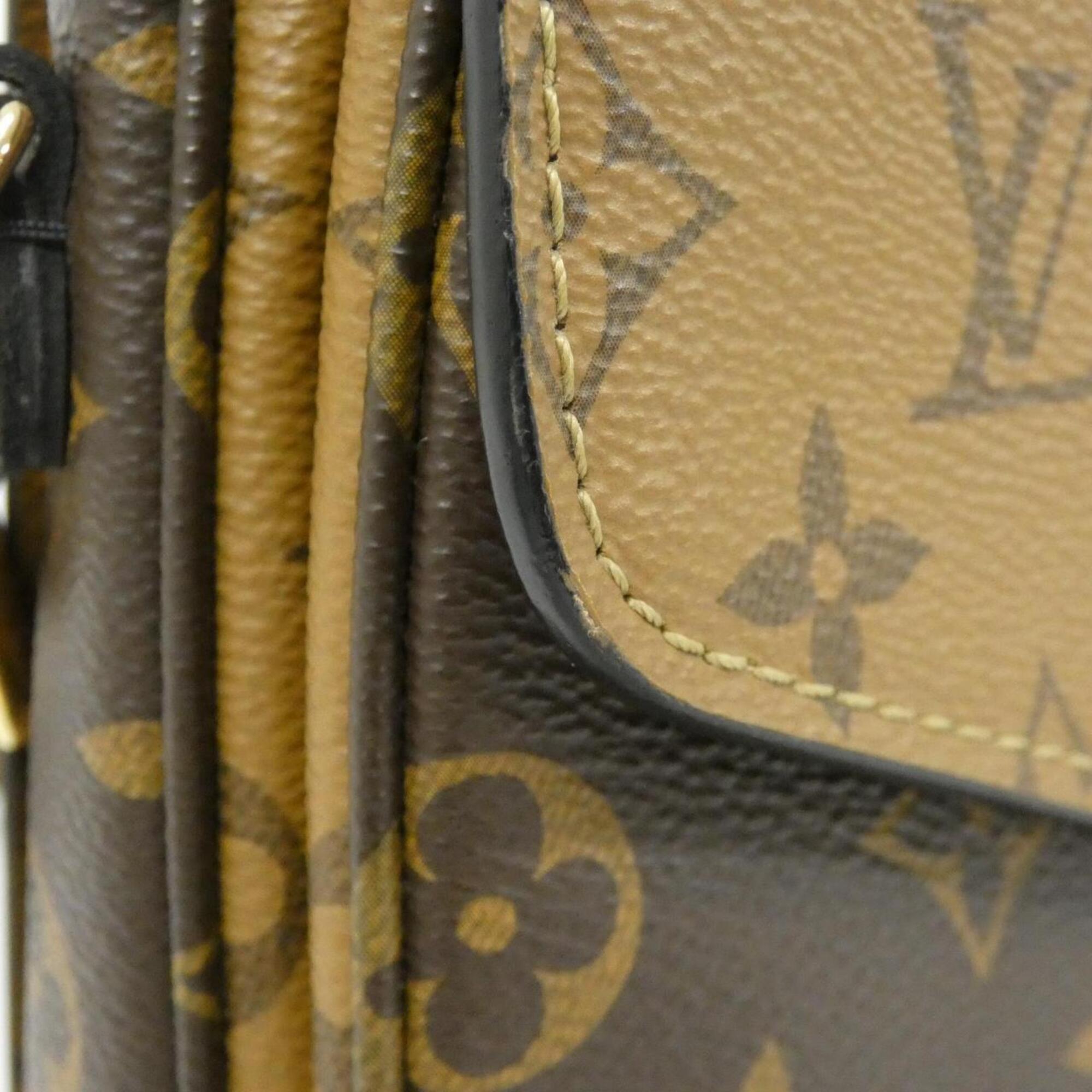 Pochette Metis Reverse Monogram Canvas