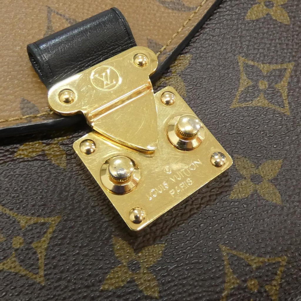 Pochette Metis Reverse Monogram Canvas