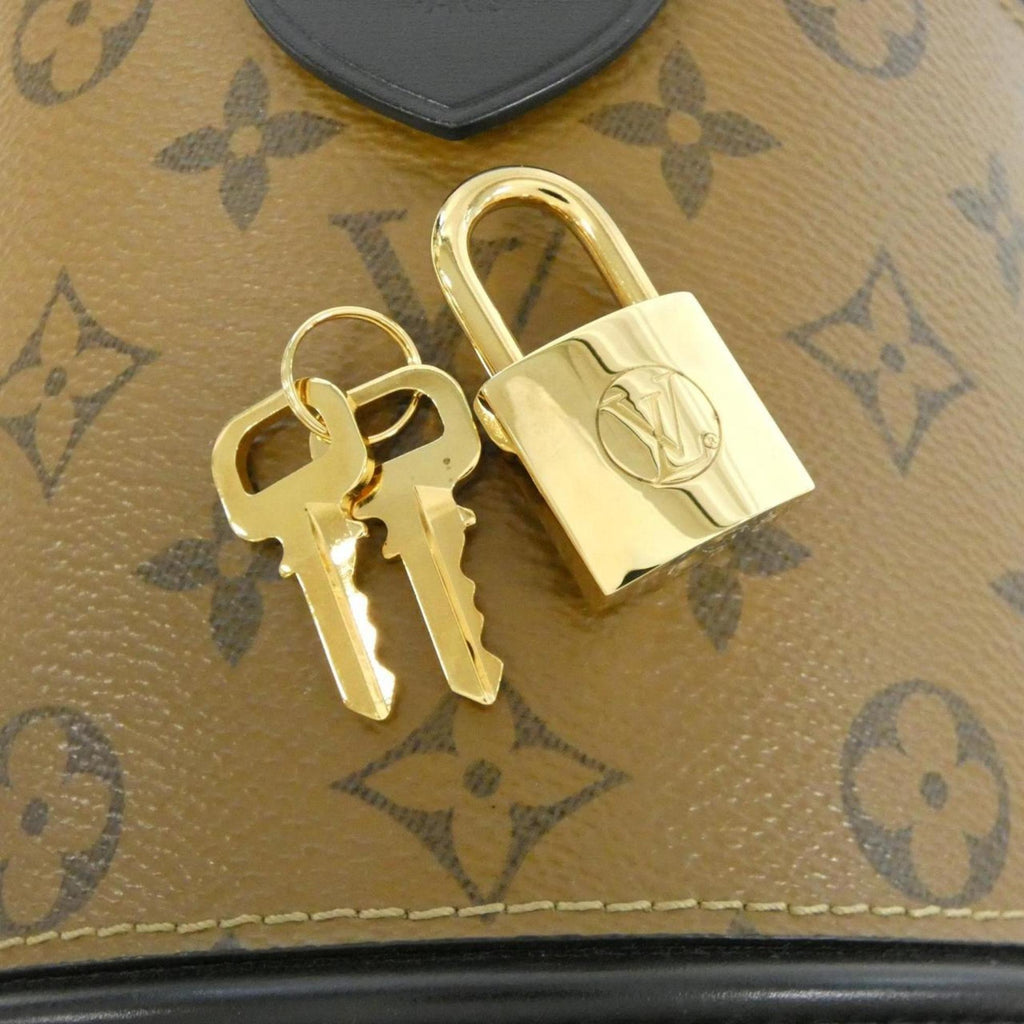 Louis Vuitton Brown Coated Canvas Handbag (Pre-Owned)