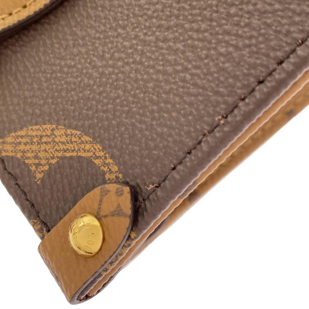 Louis Vuitton Marron Coated Canvas Handbag Pouch (Pre-Owned)