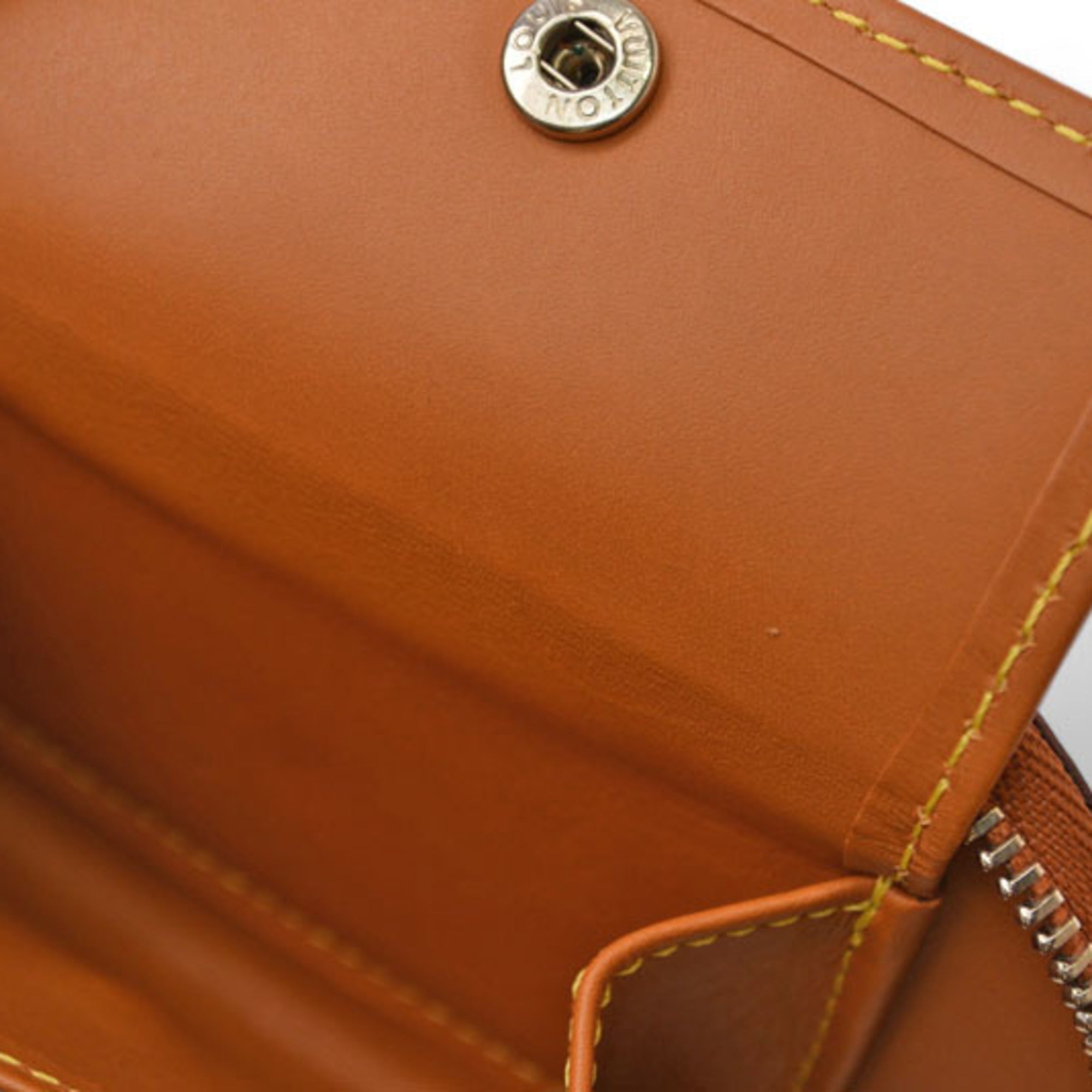 Louis Vuitton Nomad Brown Leather Wallet (Bi-Fold) (Pre-Owned)