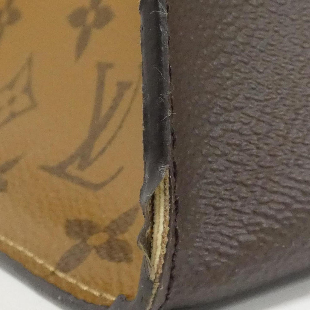 Louis Vuitton Brown Coated Canvas Handbag (Pre-Owned)