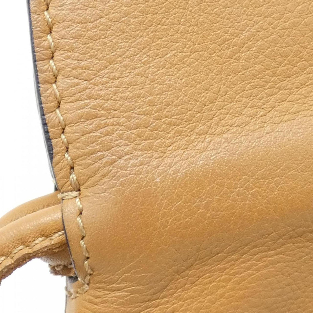 Flamenco Knot Clutch Leather Mini