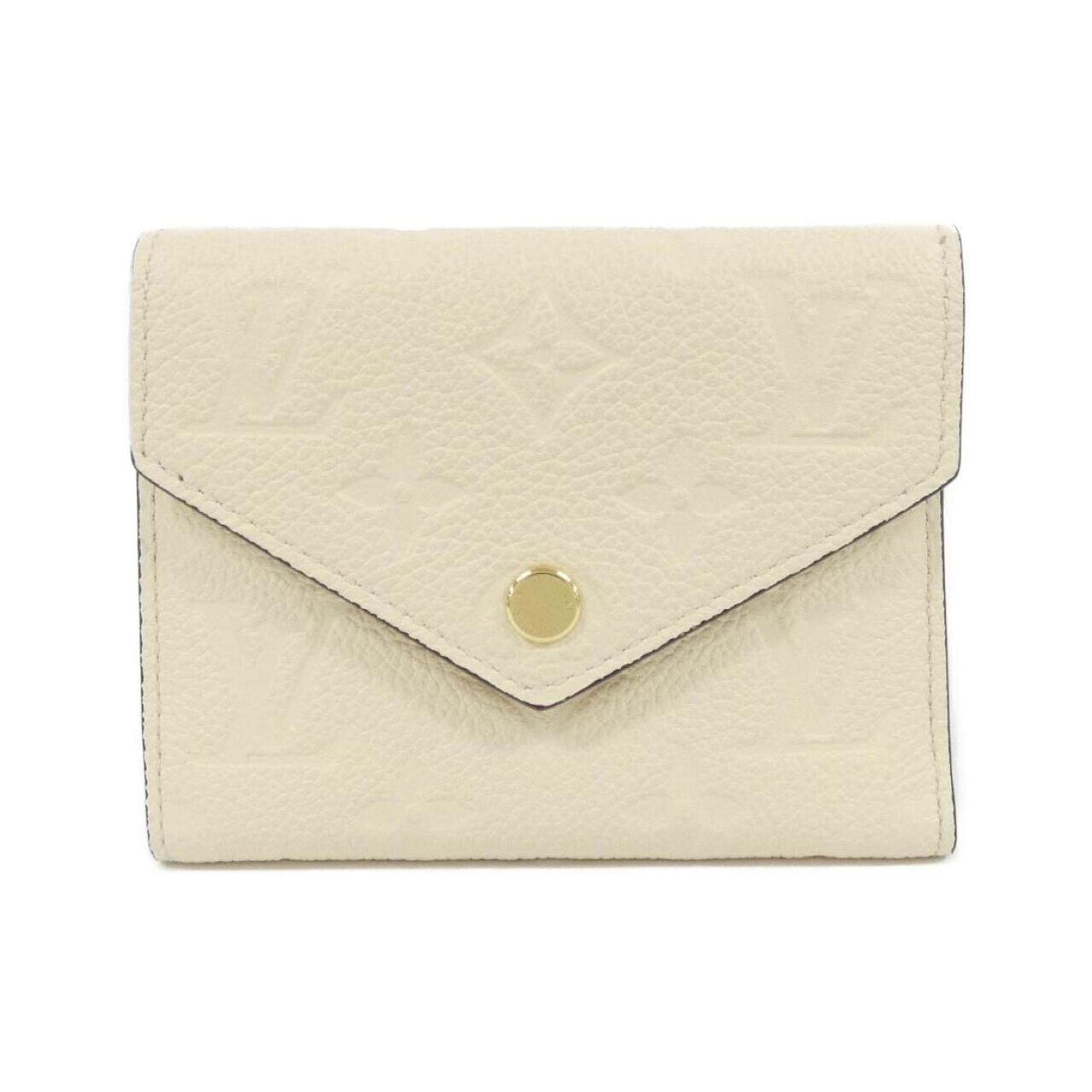 Louis Vuitton Cream Leather Wallet (Tri-Fold) (Pre-Owned)