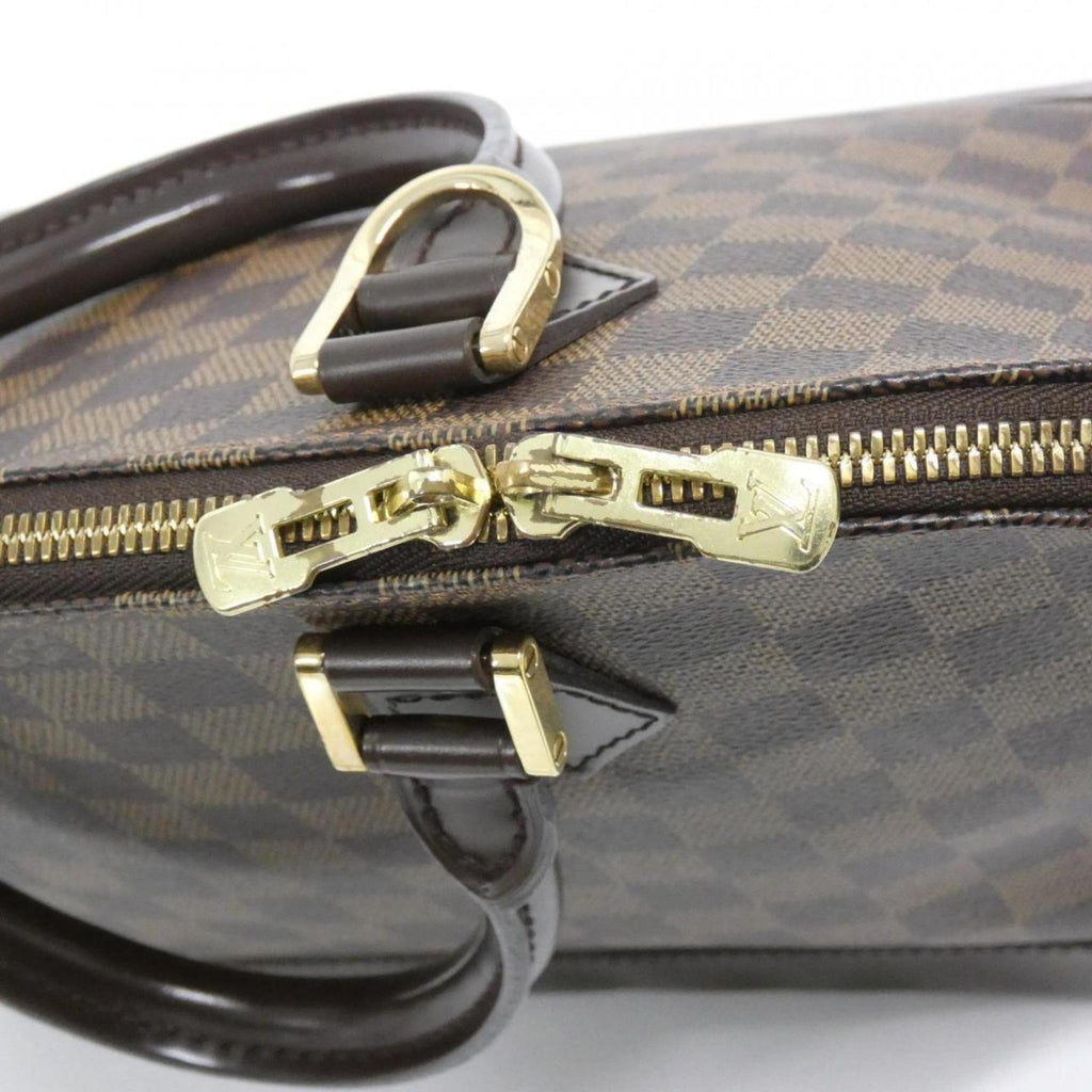 Louis Vuitton Brown Coated Canvas Handbag (Pre-Owned)