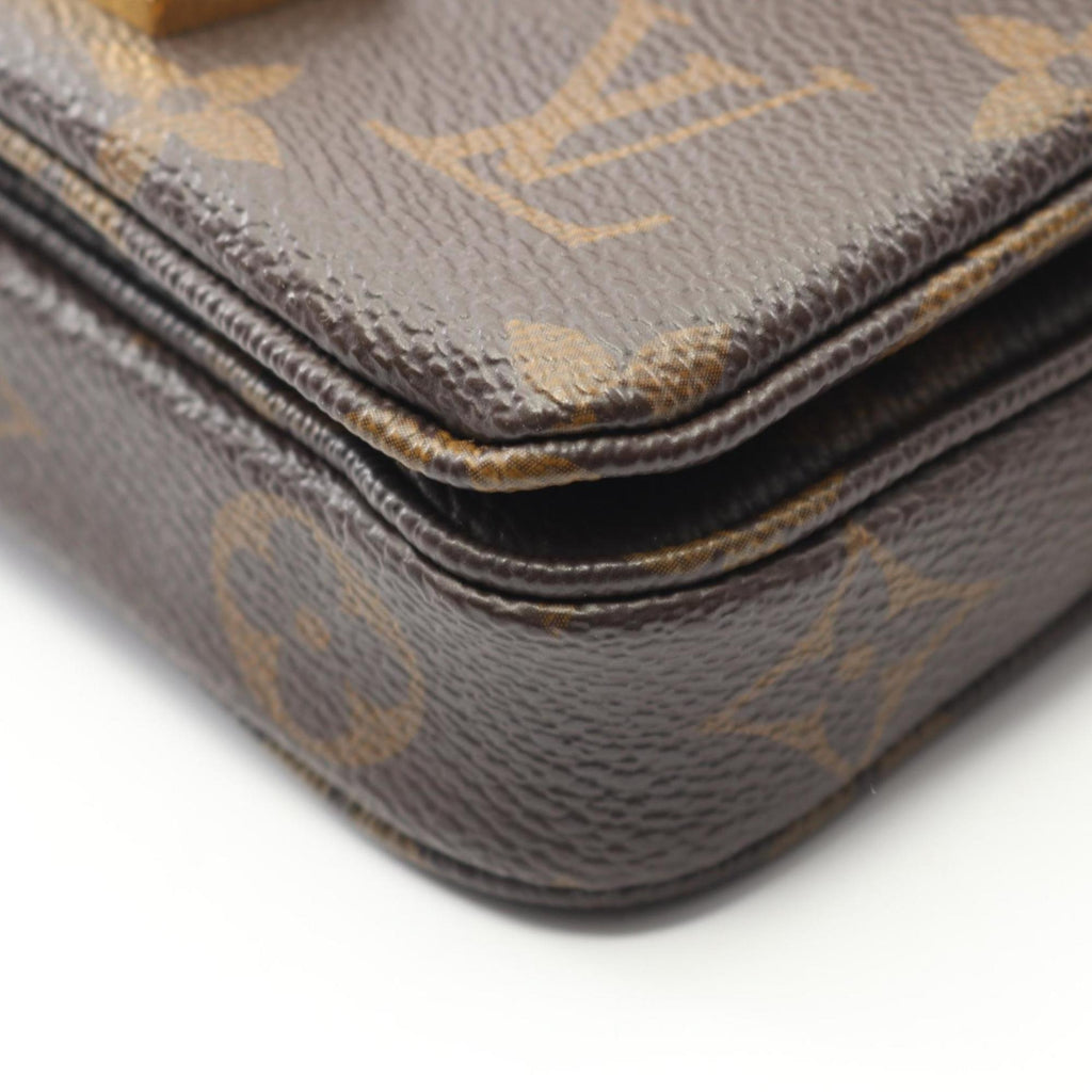 Louis Vuitton Brown Monogram Leather Handbag (Pre-Owned)