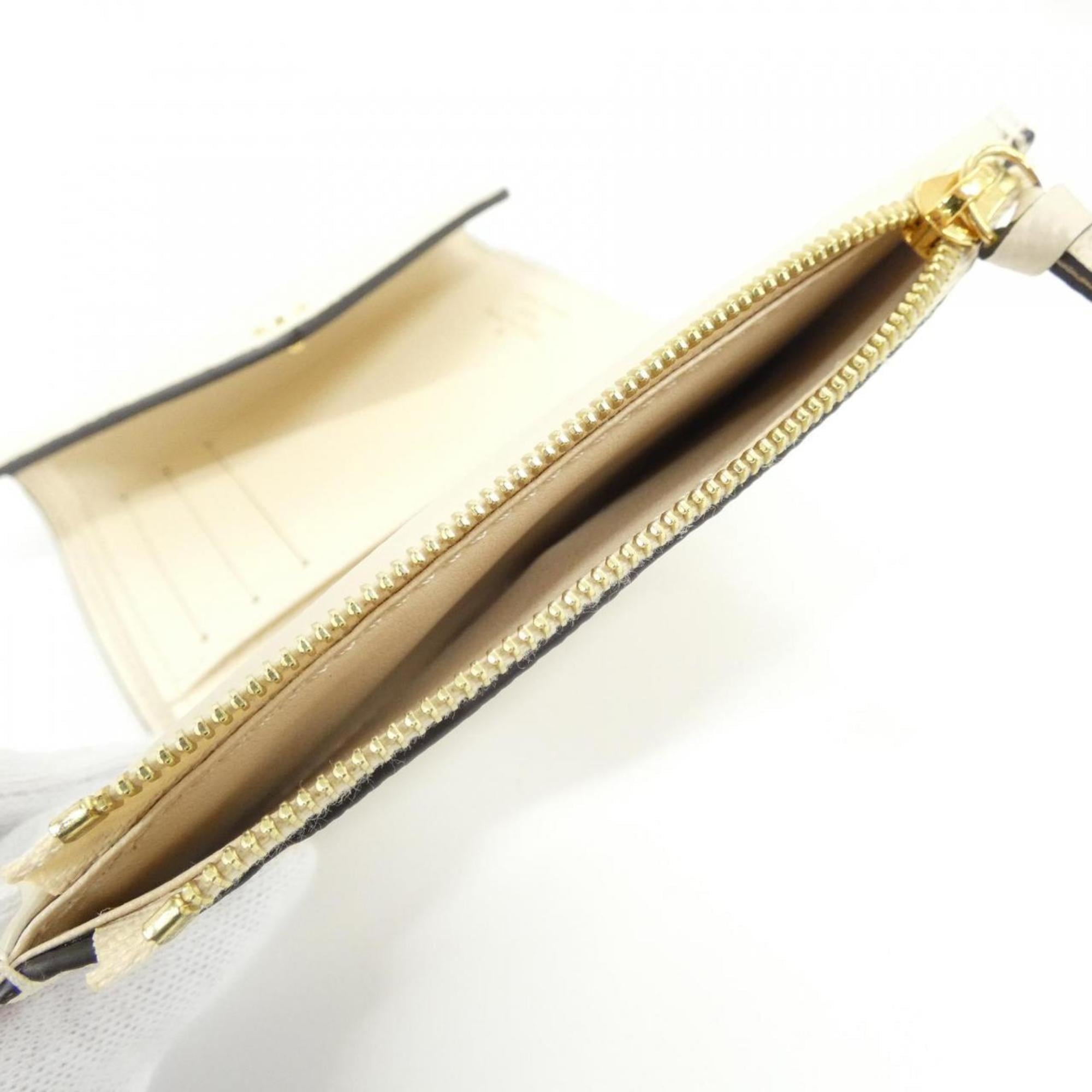 Louis Vuitton Cream Leather Wallet (Tri-Fold) (Pre-Owned)