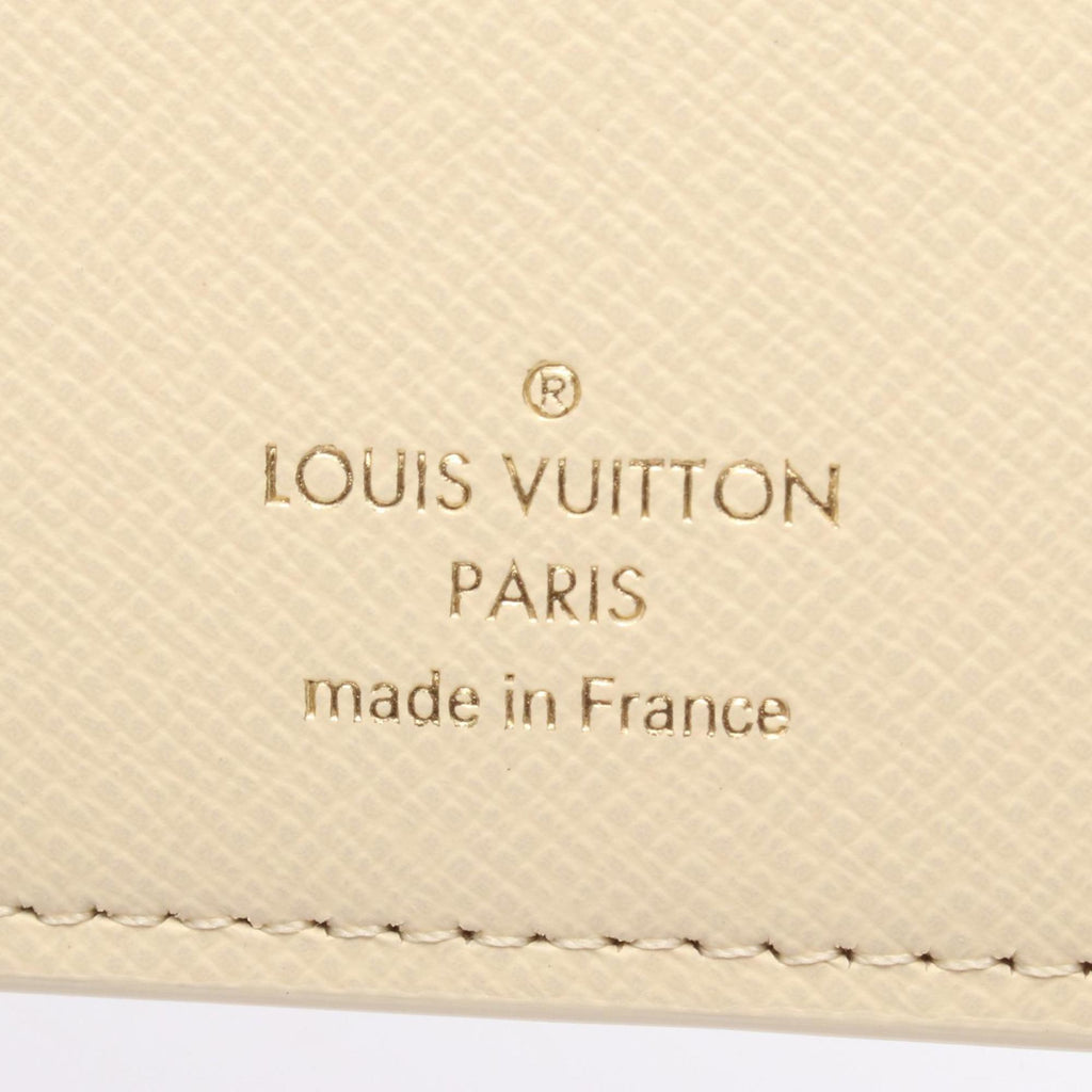 Louis Vuitton Ivory Multi-Color Coated Canvas Pvc Leather Long Wallet (Bi-Fold) (Pre-Owned)