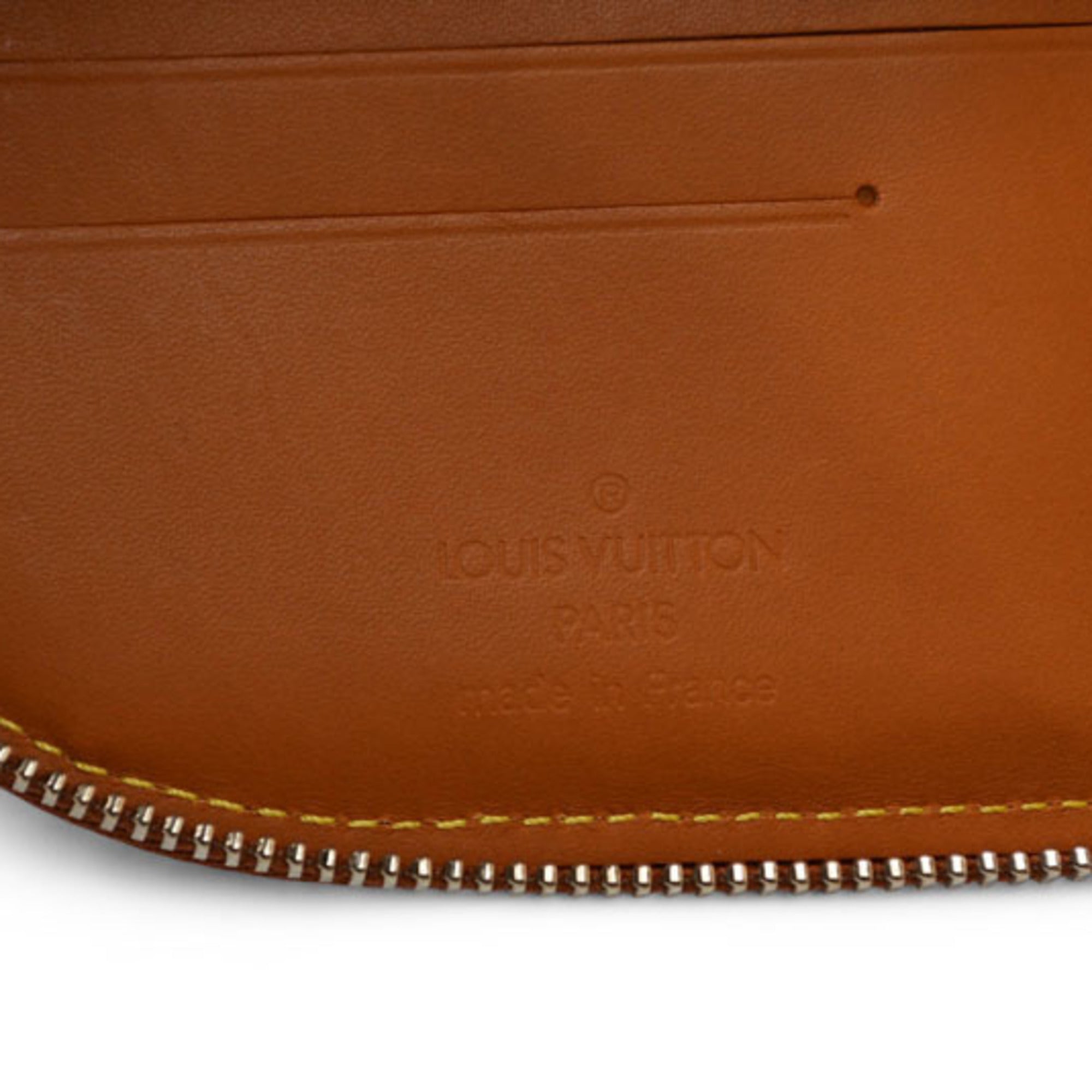 Louis Vuitton Nomad Brown Leather Wallet (Bi-Fold) (Pre-Owned)