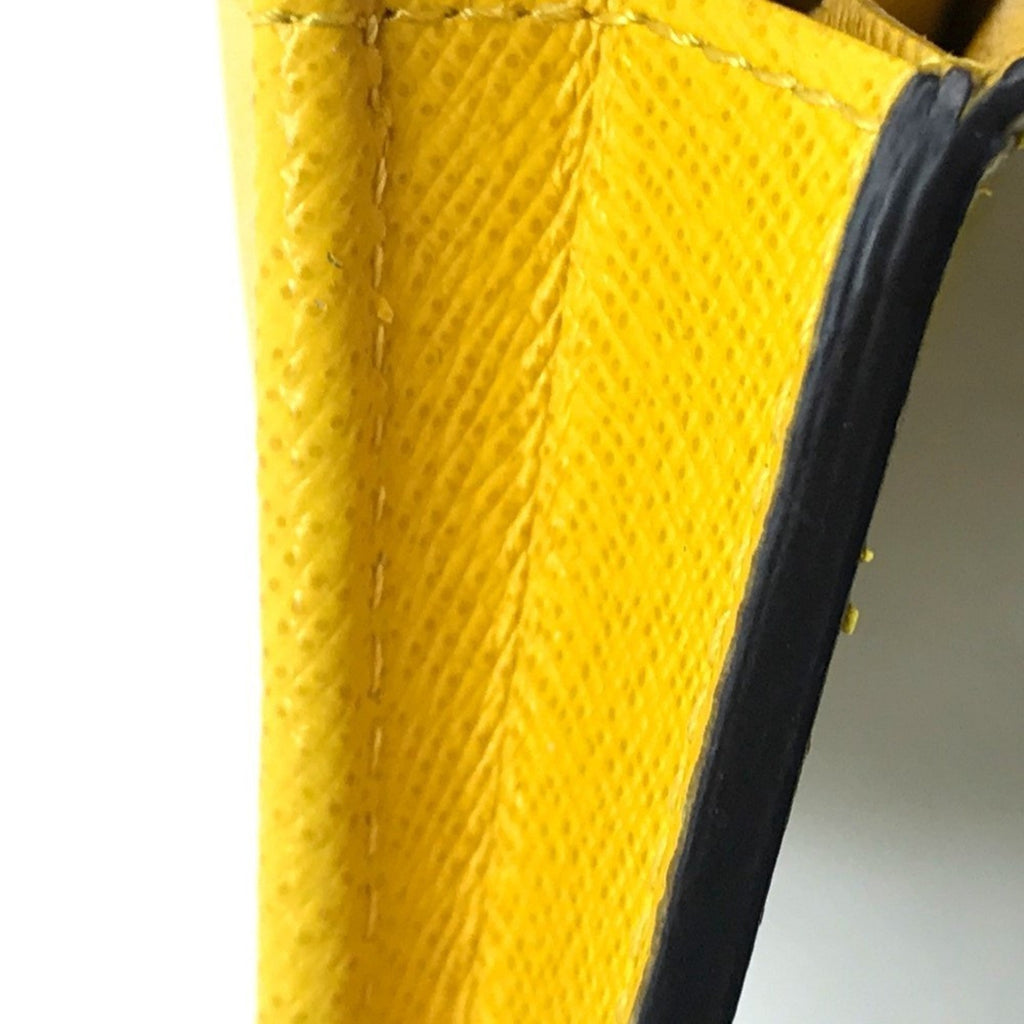 Louis Vuitton Taiga Jaune Yellow Taiga Leather Long Wallet (Bi-Fold) (Pre-Owned)