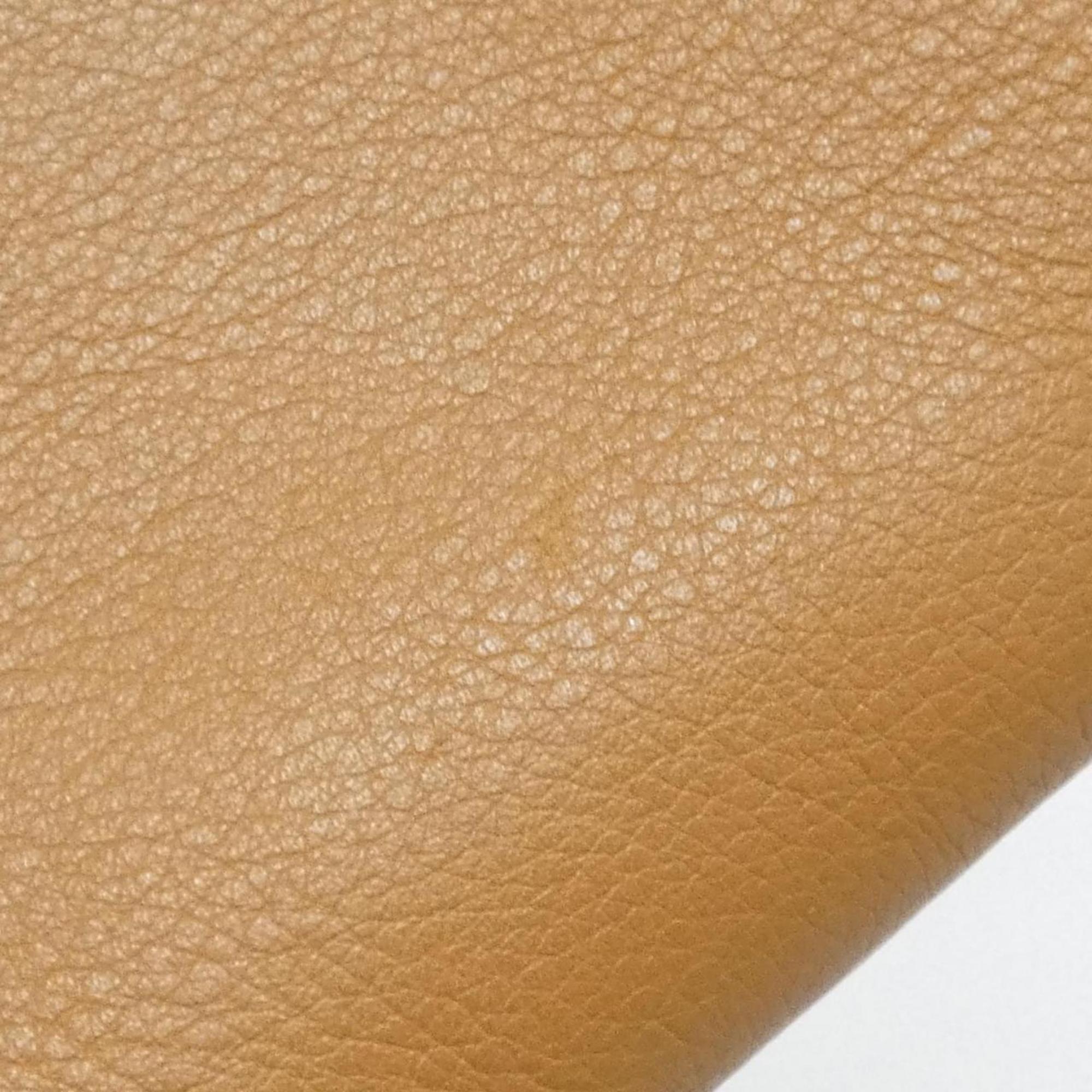 Flamenco Knot Clutch Leather Mini