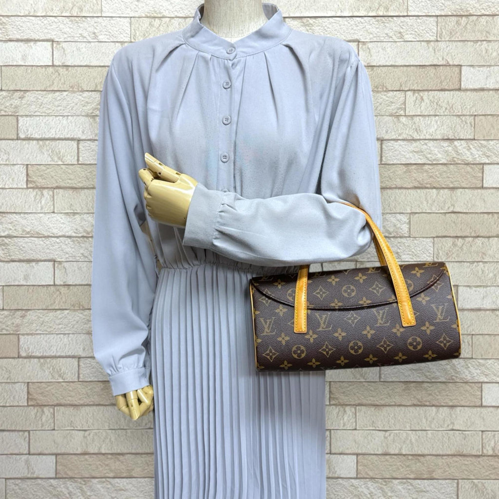 Louis Vuitton Brown Monogram Handbag (Pre-Owned)