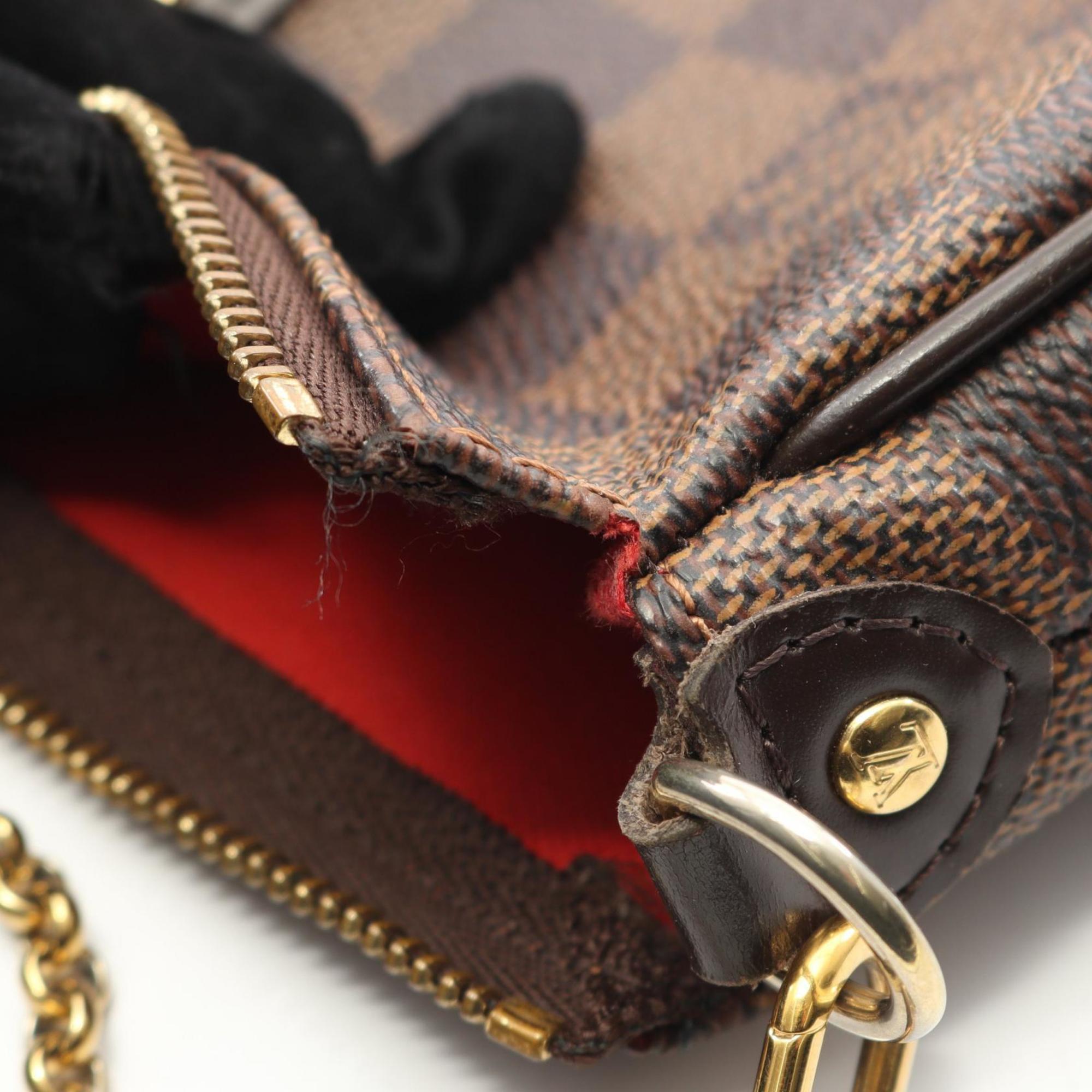Louis Vuitton Brown Coated Canvas Leather Handbag (Pre-Owned)