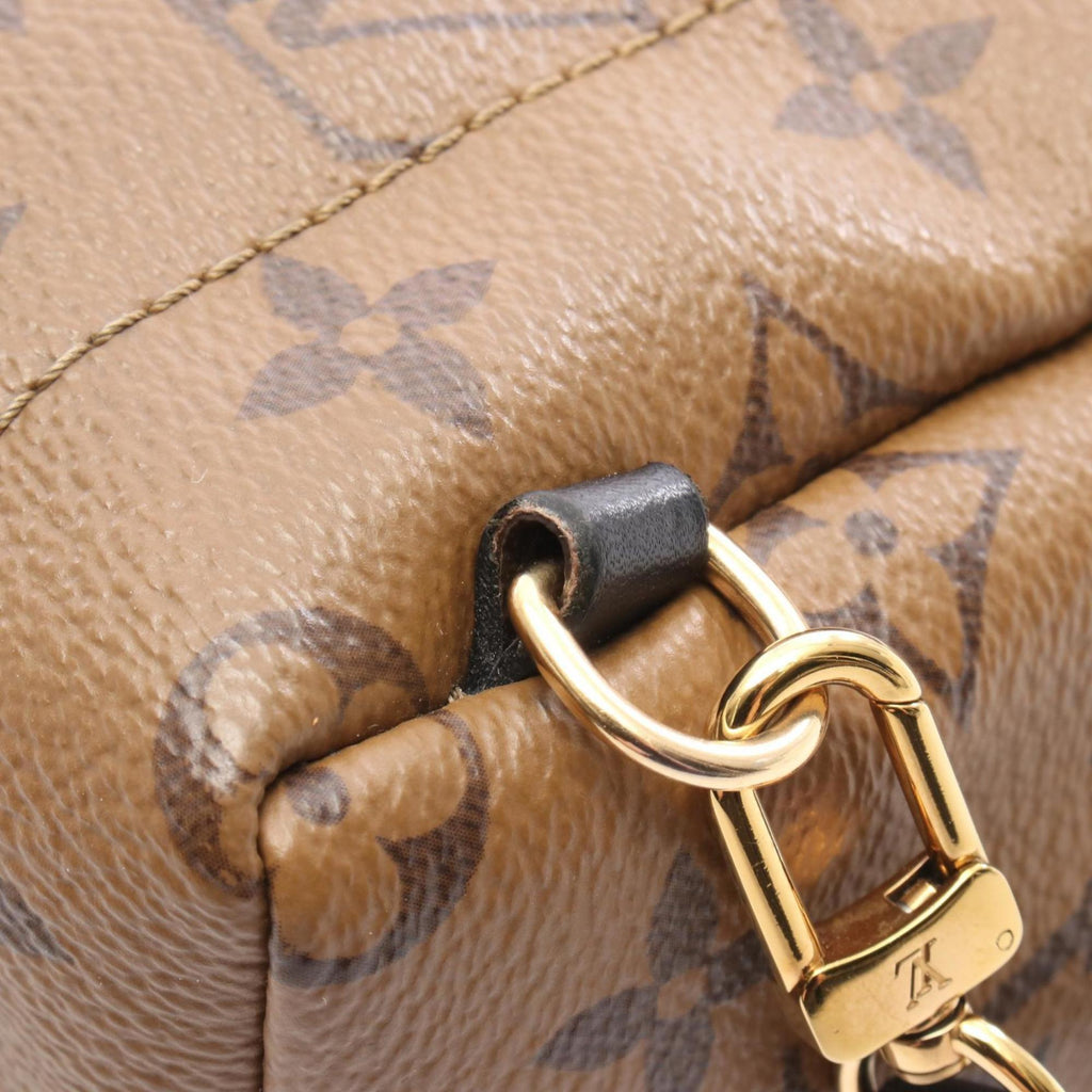 Louis Vuitton Brown Coated Canvas Leather Backpack (Pre-Owned)