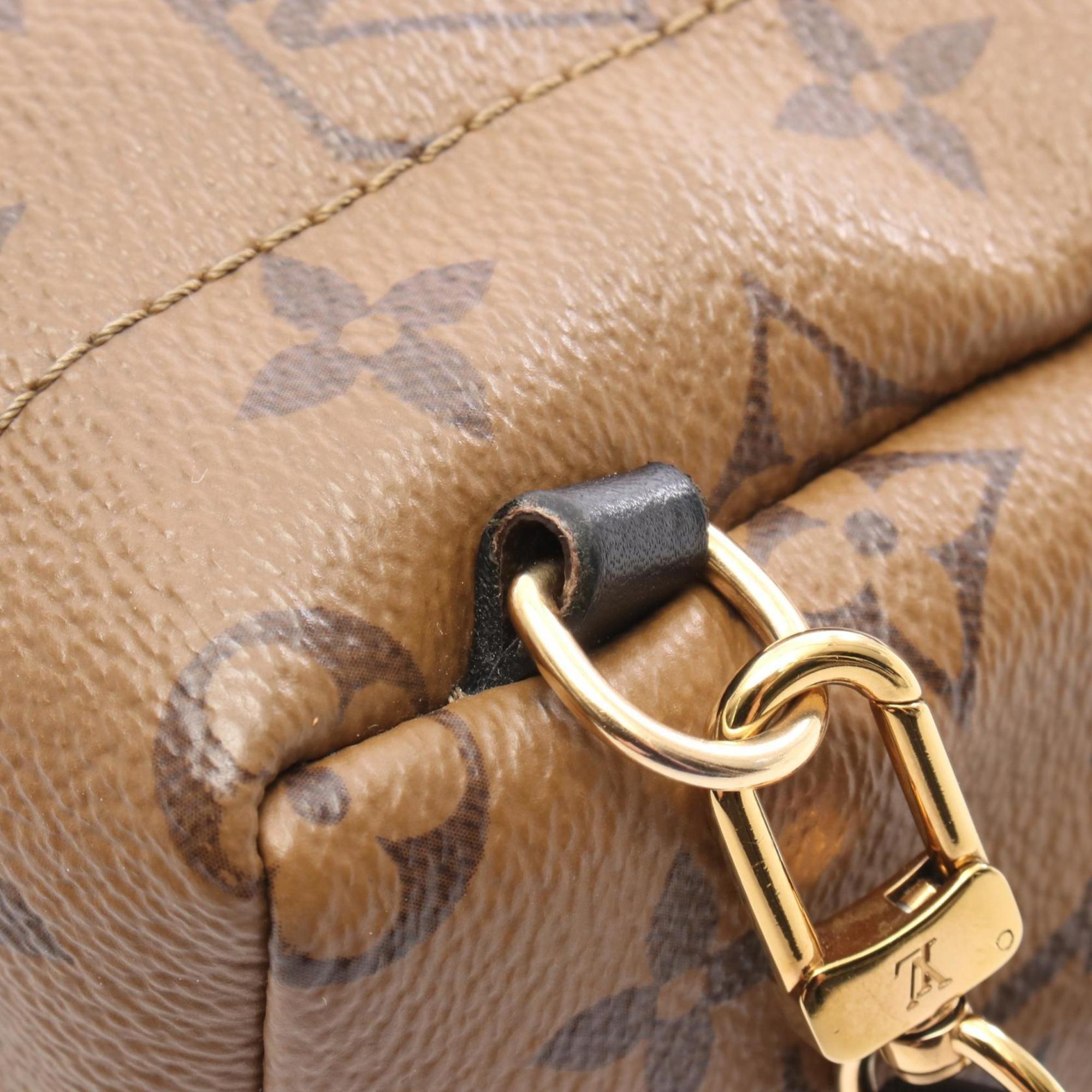 Louis Vuitton Brown Coated Canvas Leather Backpack (Pre-Owned)