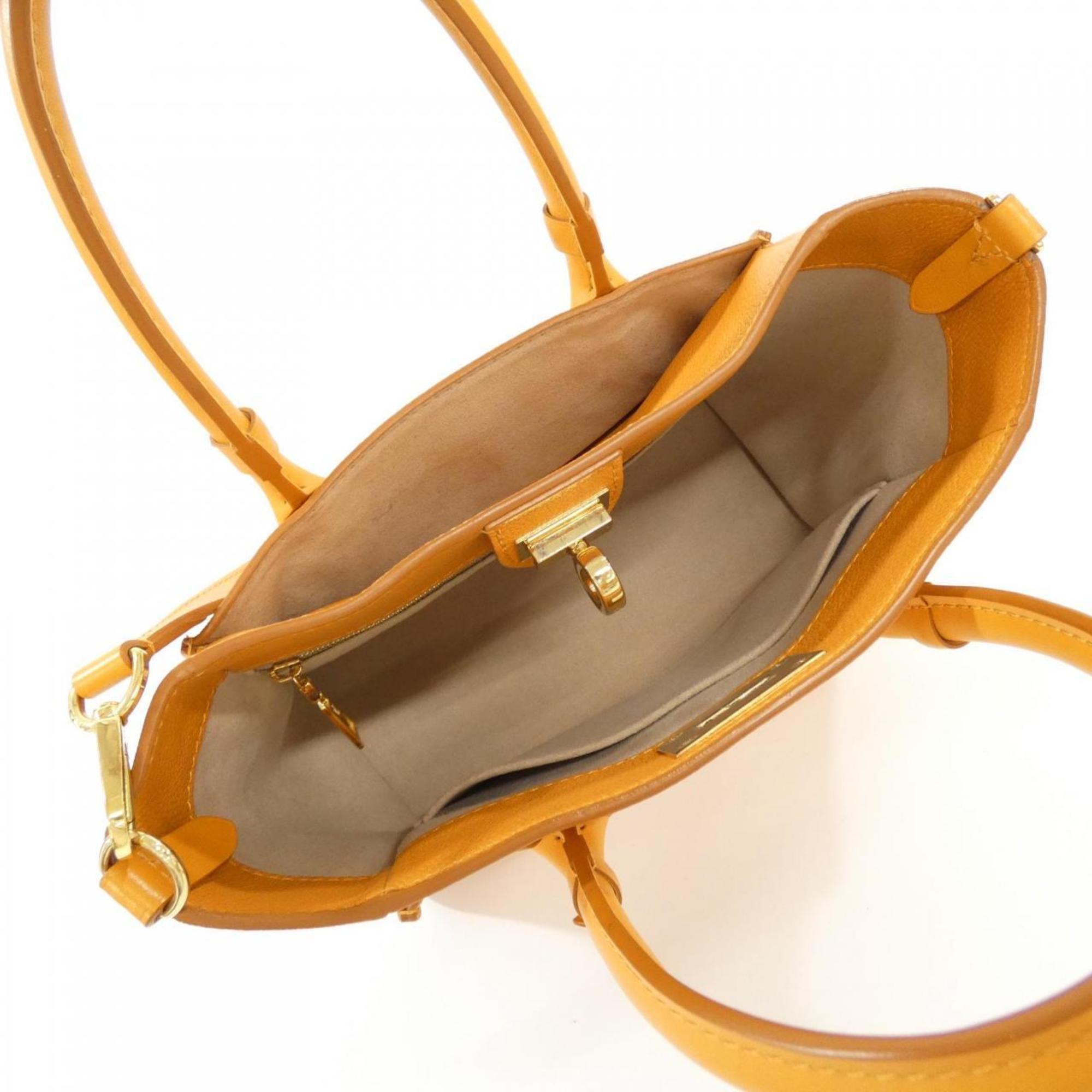 Louis Vuitton Gold Orange Leather Handbag (Pre-Owned)