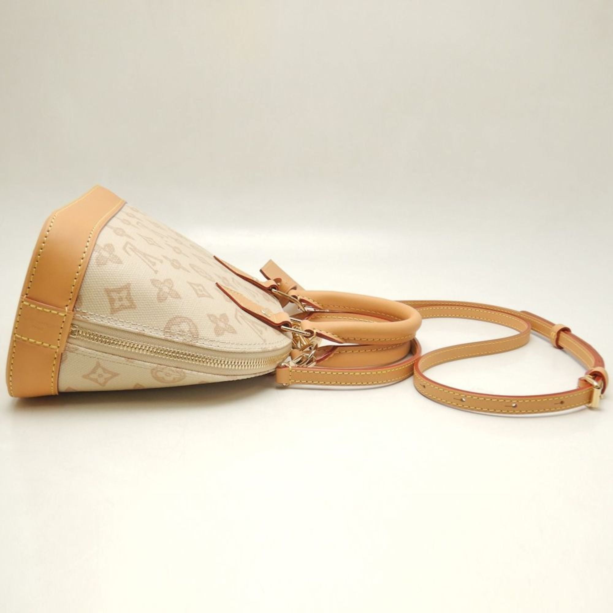 Louis Vuitton Gold Canvas Leather Handbag (Pre-Owned)