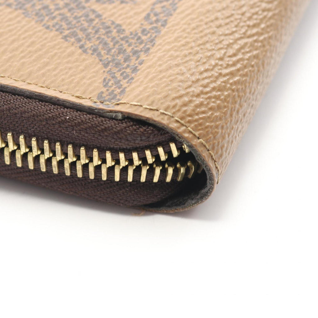 Louis Vuitton Brown Coated Canvas Long Wallet (Bi-Fold) (Pre-Owned)