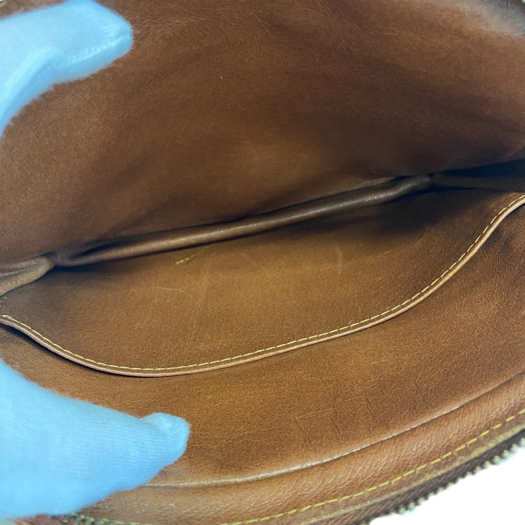 Louis Vuitton Brown Monogram Leather Clutch Bag (Pre-Owned)