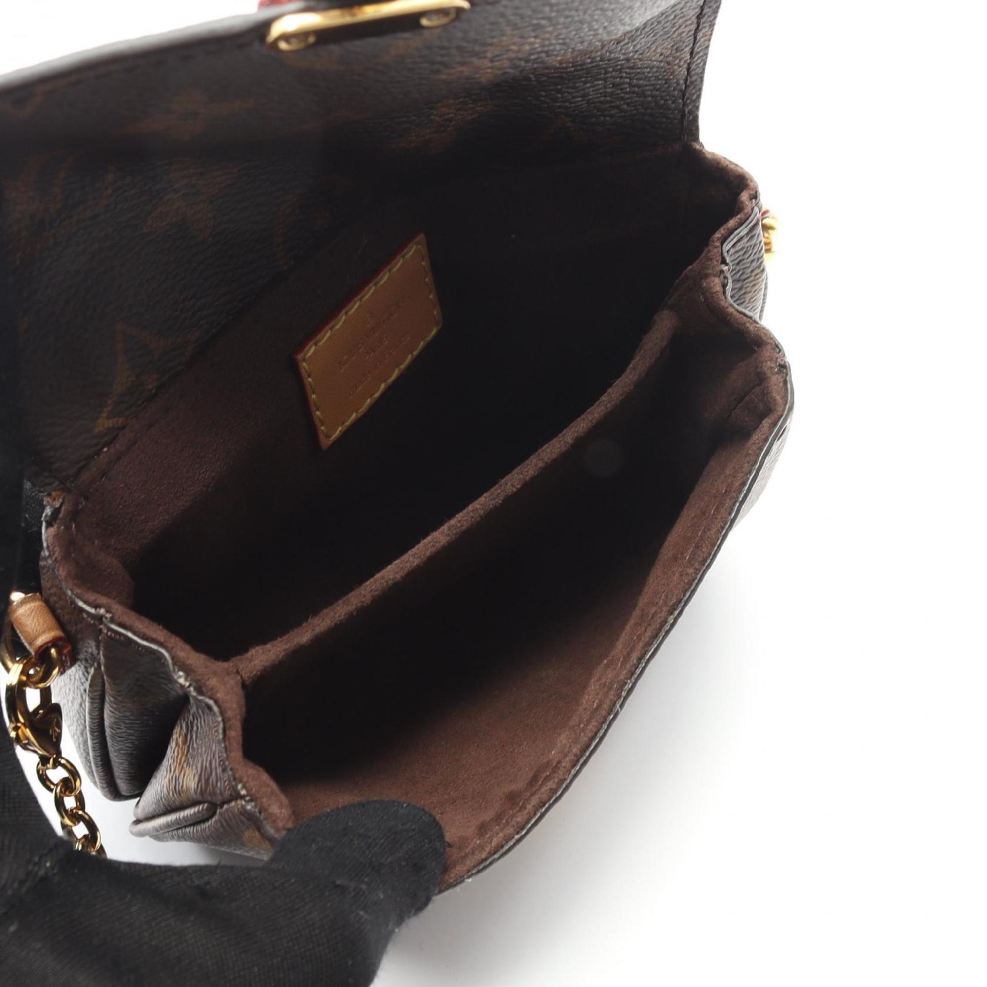 Louis Vuitton Brown Monogram Leather Handbag (Pre-Owned)