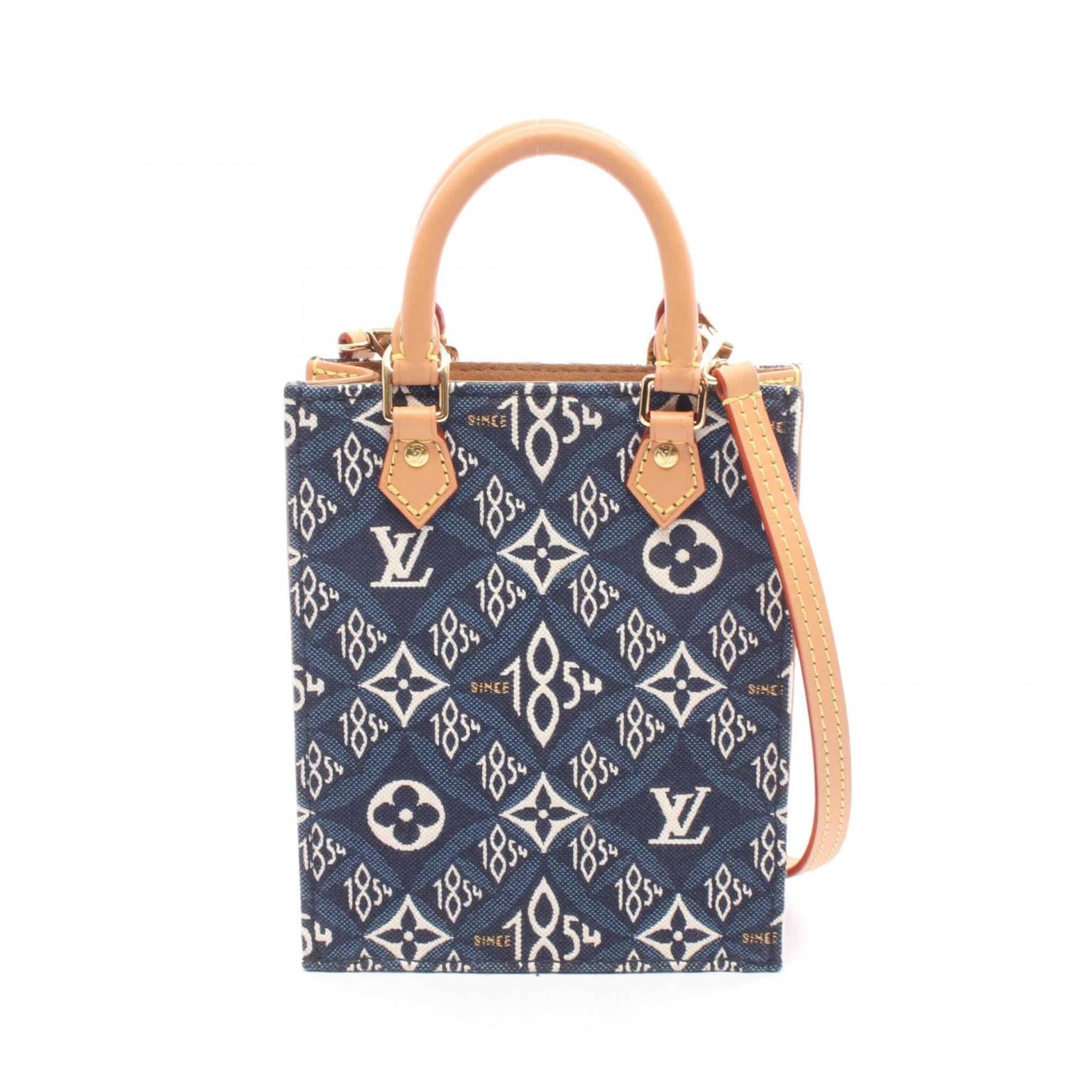 Louis Vuitton Brown Navy White Canvas Leather Monogram Jacquard Handbag (Pre-Owned)