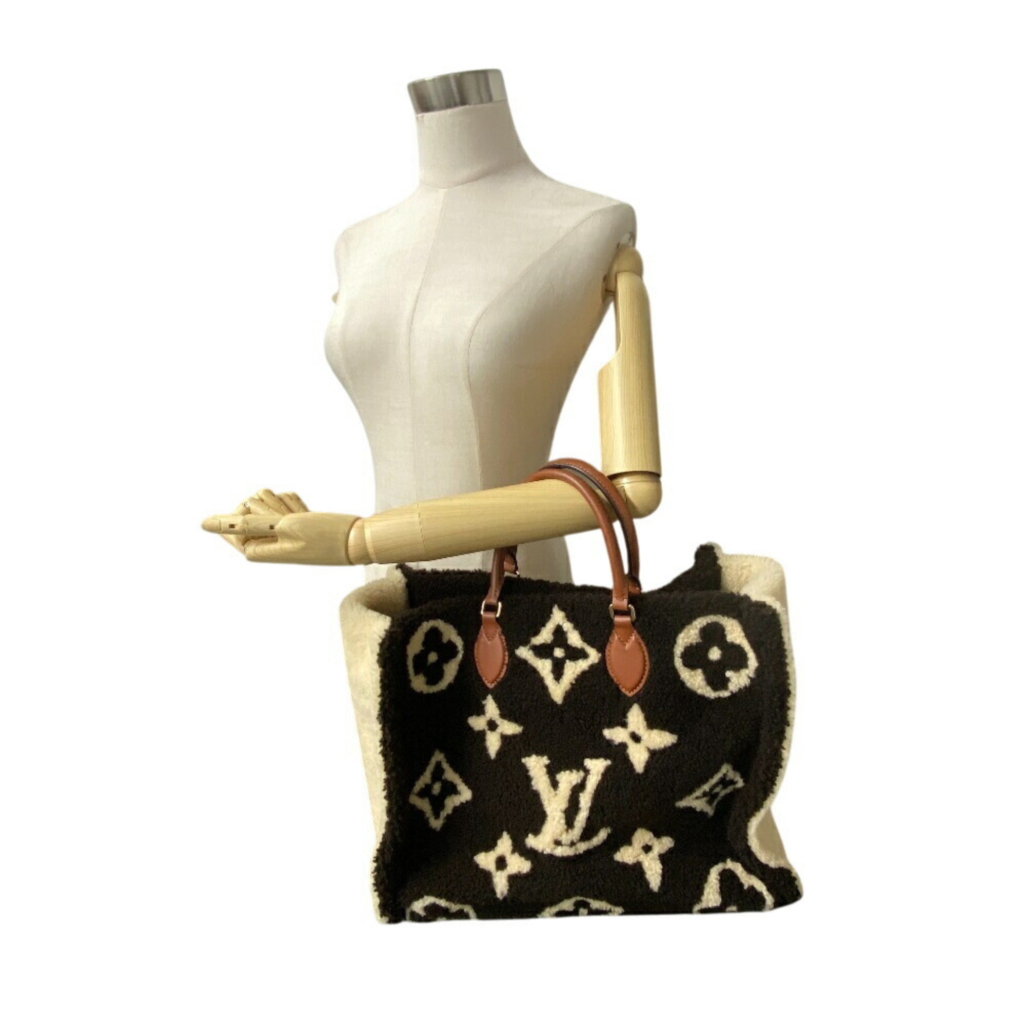 Louis Vuitton Brown Ivory Leather Handbag (Pre-Owned)