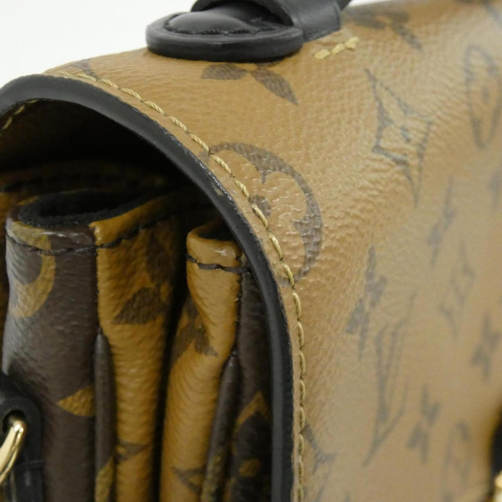 Pochette Metis Reverse Monogram Canvas