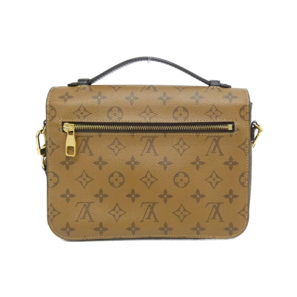 Pochette Metis Reverse Monogram Canvas