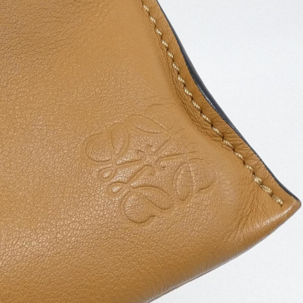 Flamenco Knot Clutch Leather Mini