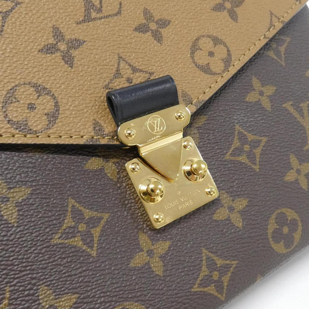 Pochette Metis Reverse Monogram Canvas