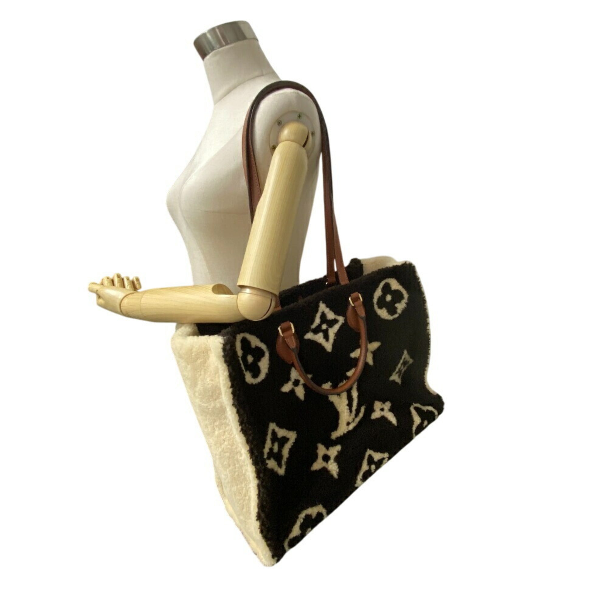 Louis Vuitton Brown Ivory Leather Handbag (Pre-Owned)