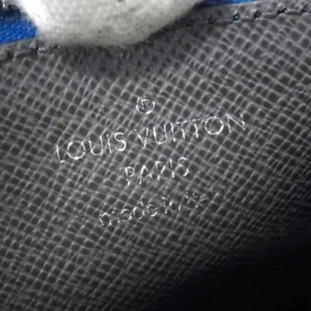Louis Vuitton Taiga Blue Taiga Leather Coin Purse/Coin Case (Pre-Owned)