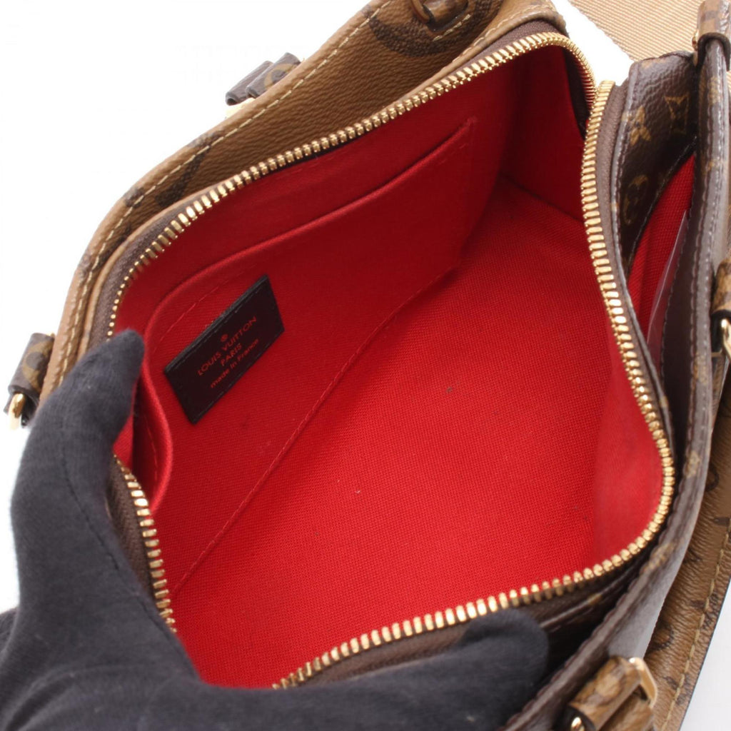 Louis Vuitton Brown Coated Canvas Handbag (Pre-Owned)