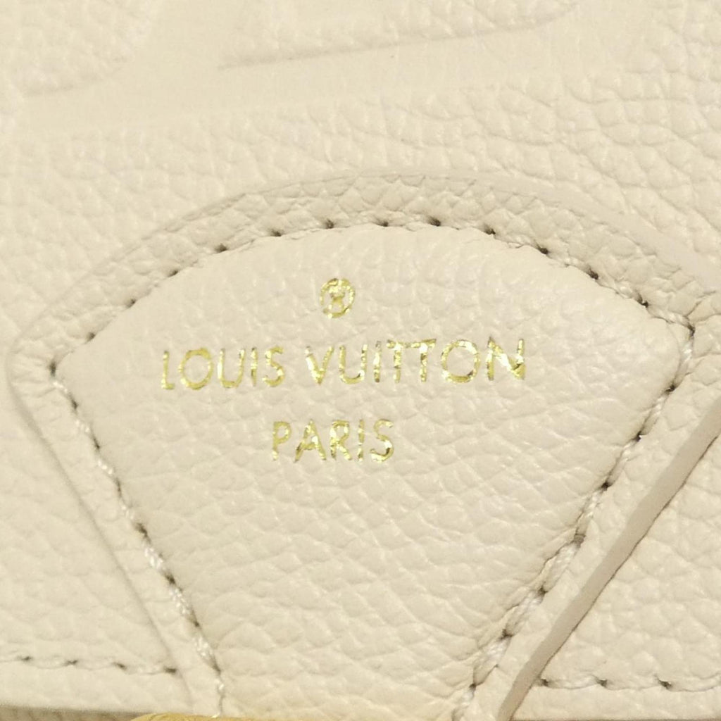 Louis Vuitton Monogram Empreinte Gold Leather Backpack (Pre-Owned)