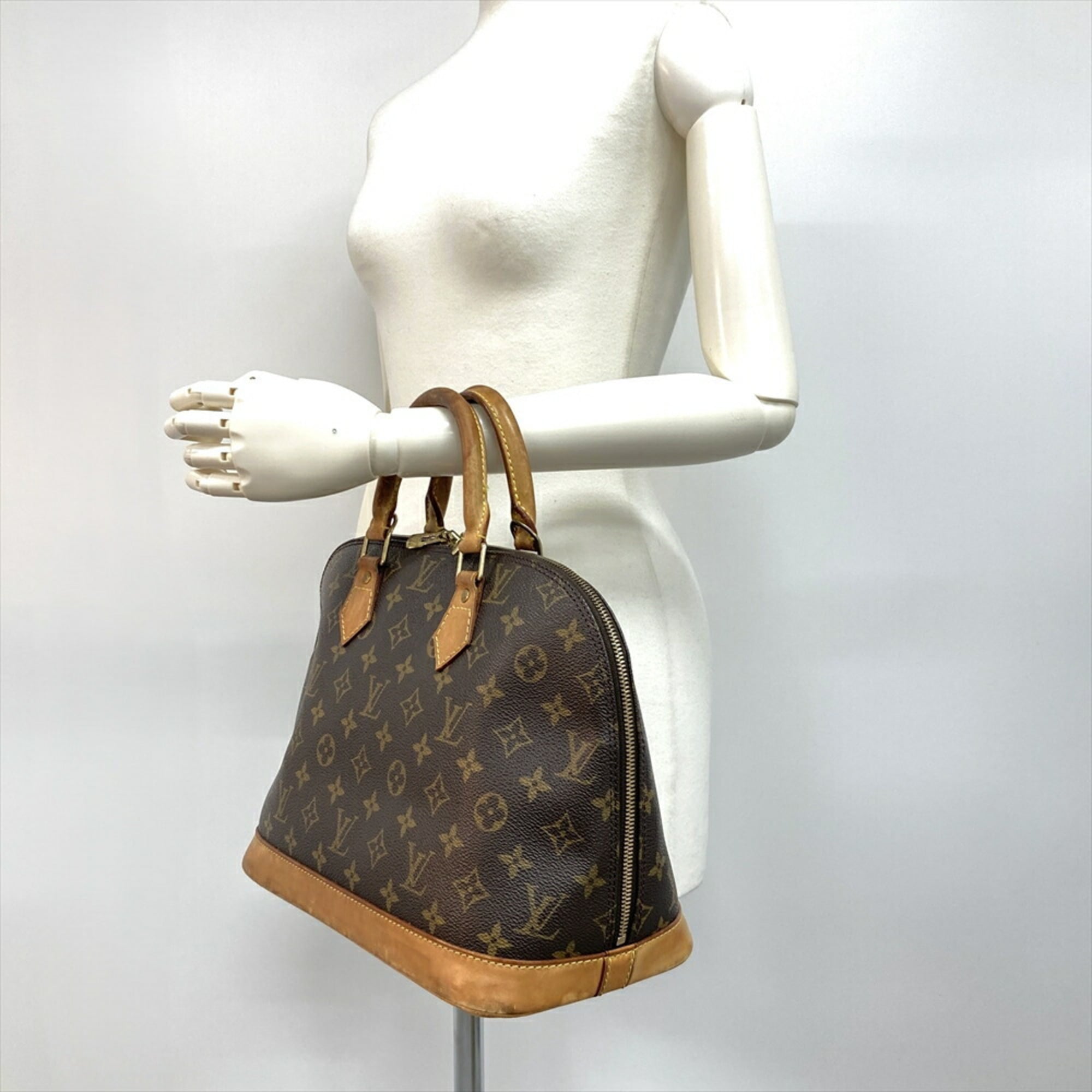 Louis Vuitton Brown Monogram Canvas Handbag (Pre-Owned)